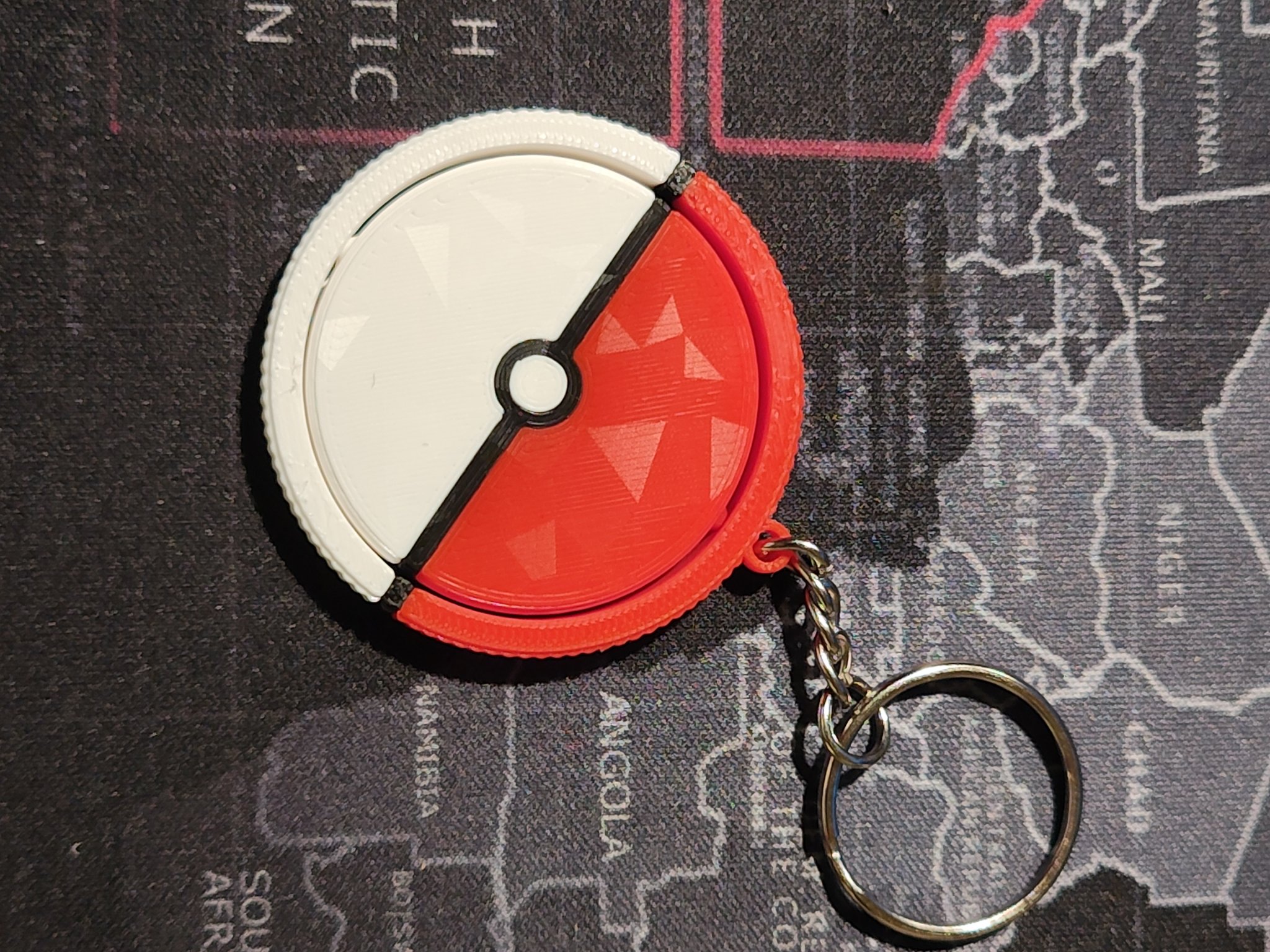 Móc khóa Pokeball xoay nhiều màu sắc in tại chỗ