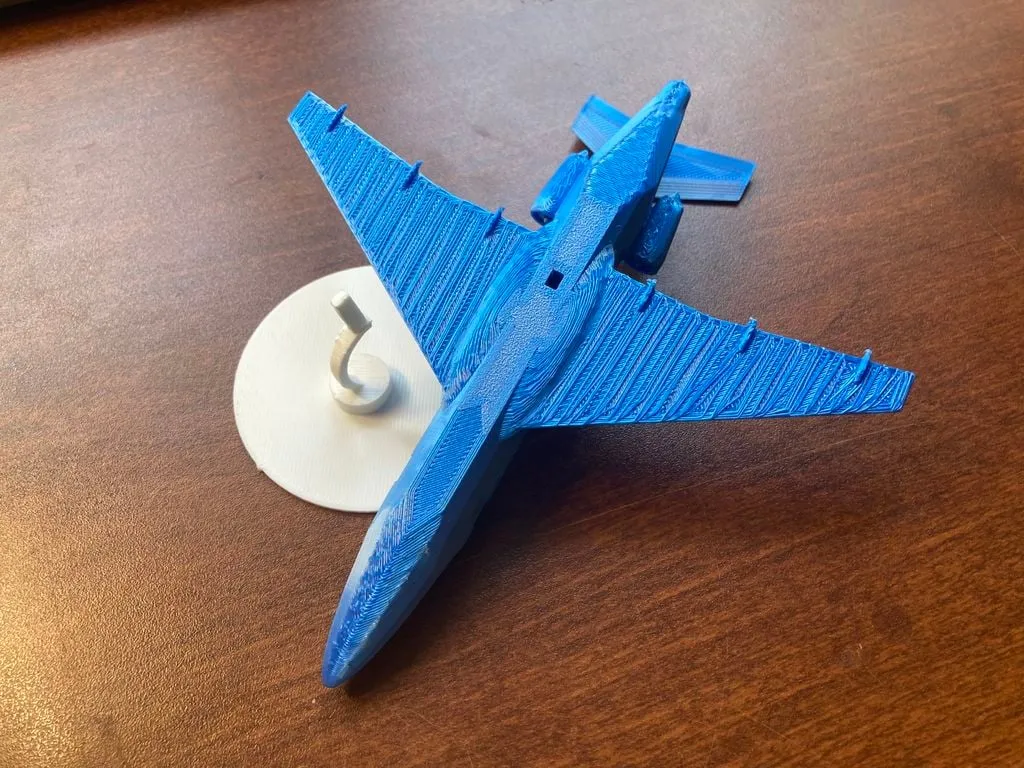 Máy bay riêng phong cách low poly với giá đỡ