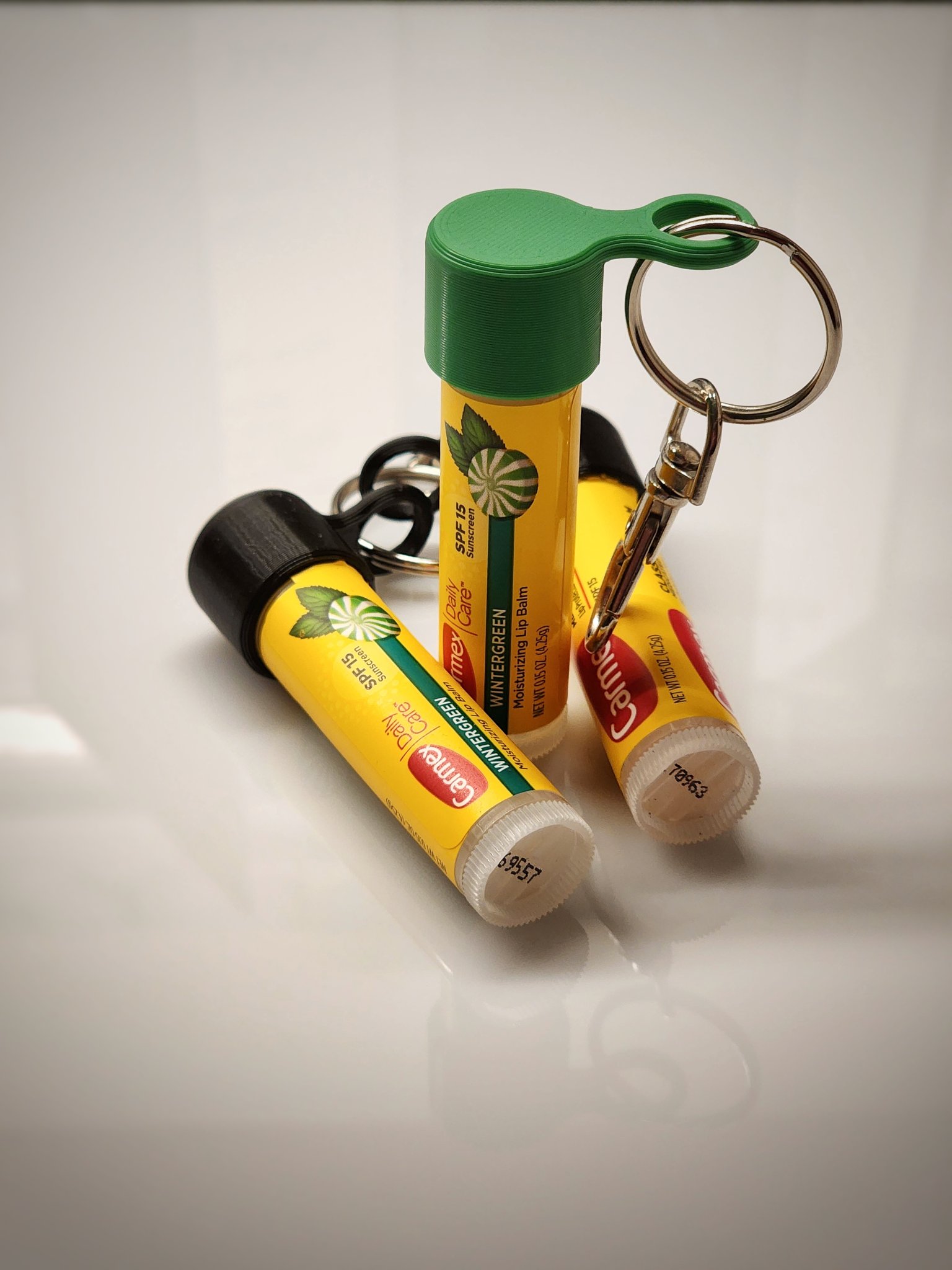 Móc khóa nắp son dưỡng môi tiện lợi