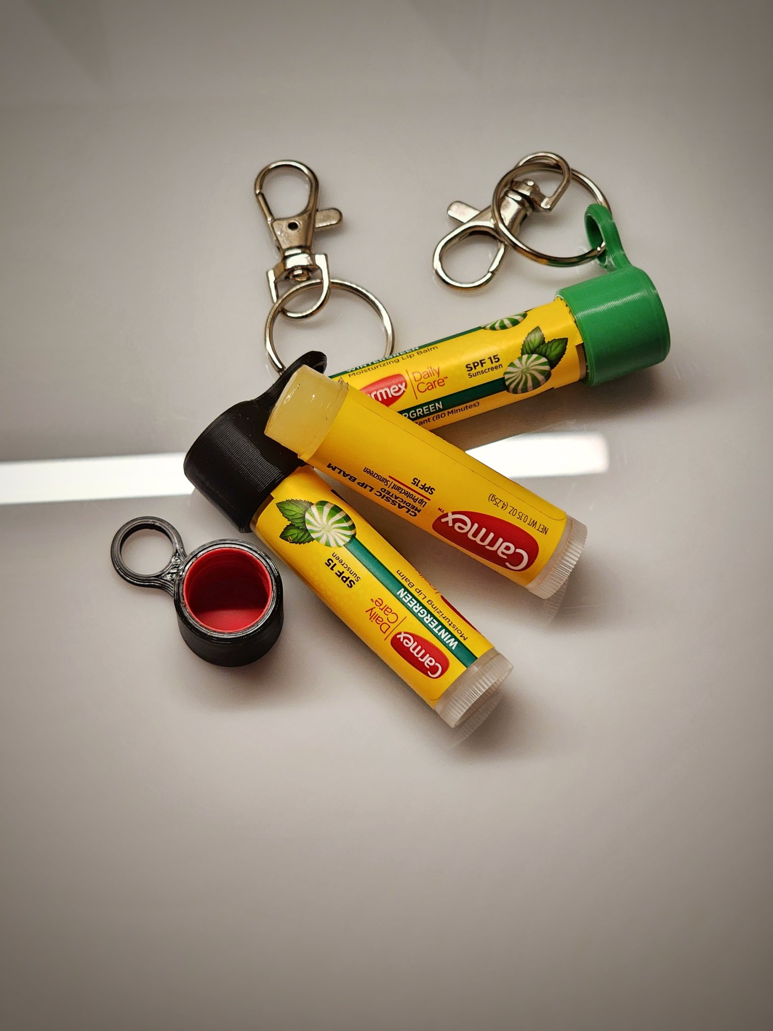 Móc khóa nắp son dưỡng môi tiện lợi