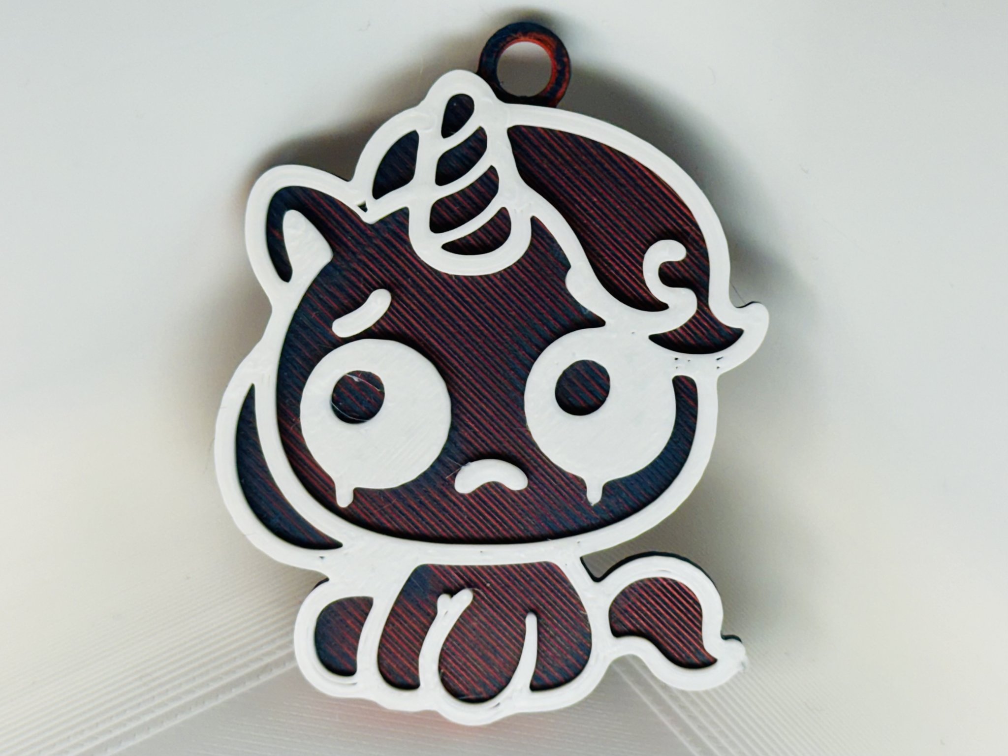 Móc khóa kỳ lân buồn bã dễ thương