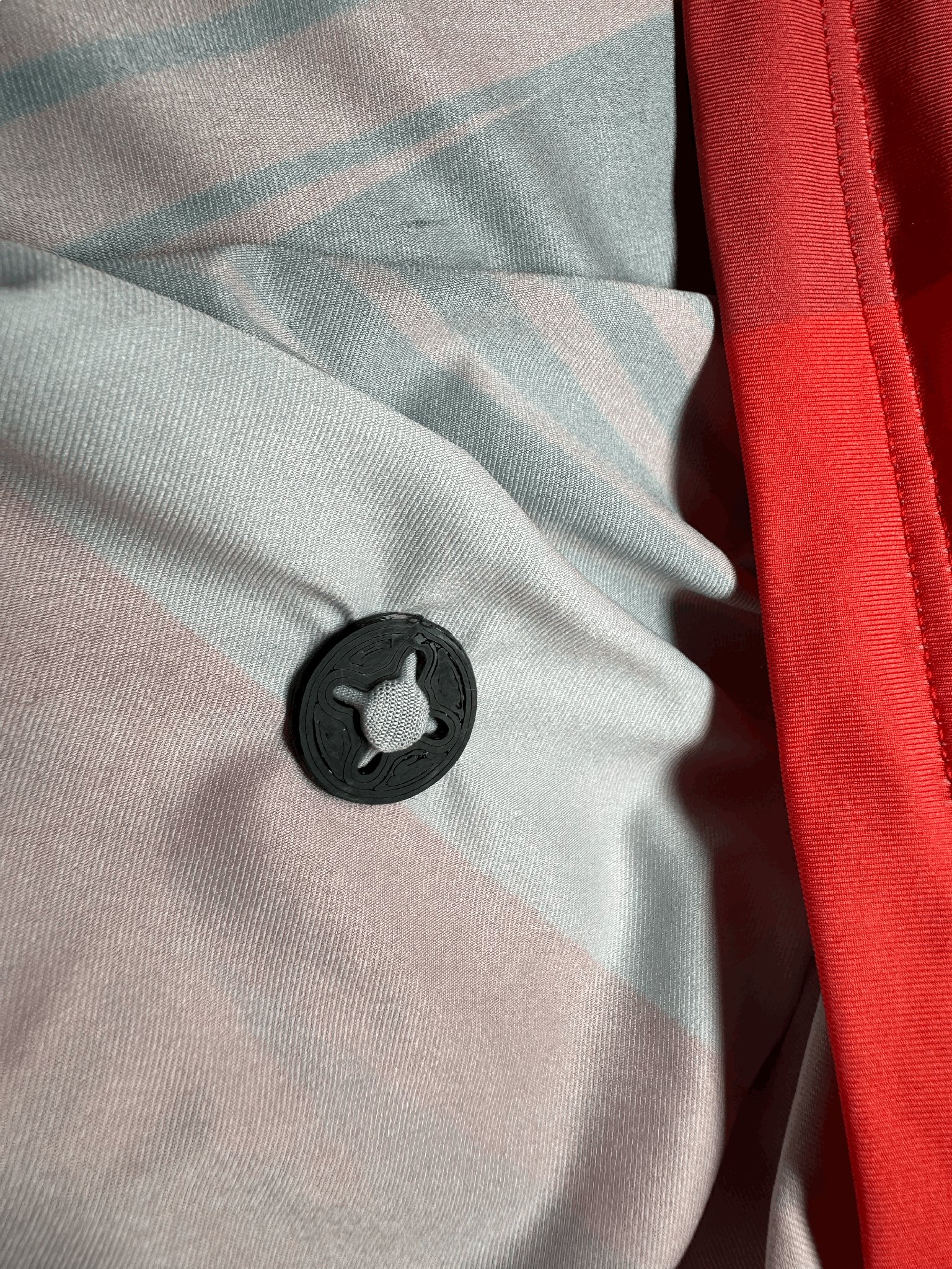 Giá đỡ/clip giữ số chạy cho áo thể thao