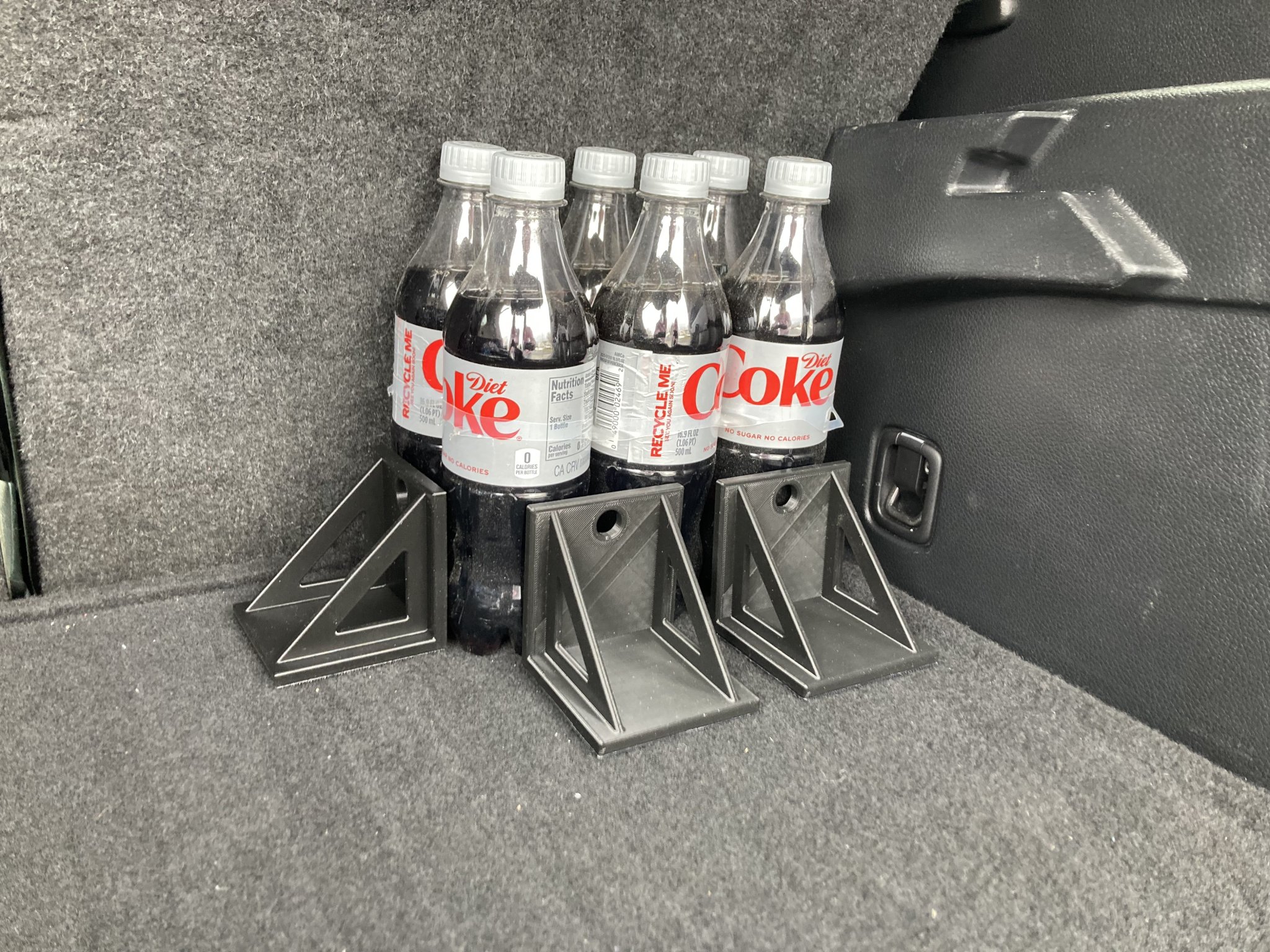 Giá đỡ hàng hóa cho khoang hành lý ô tô có thảm