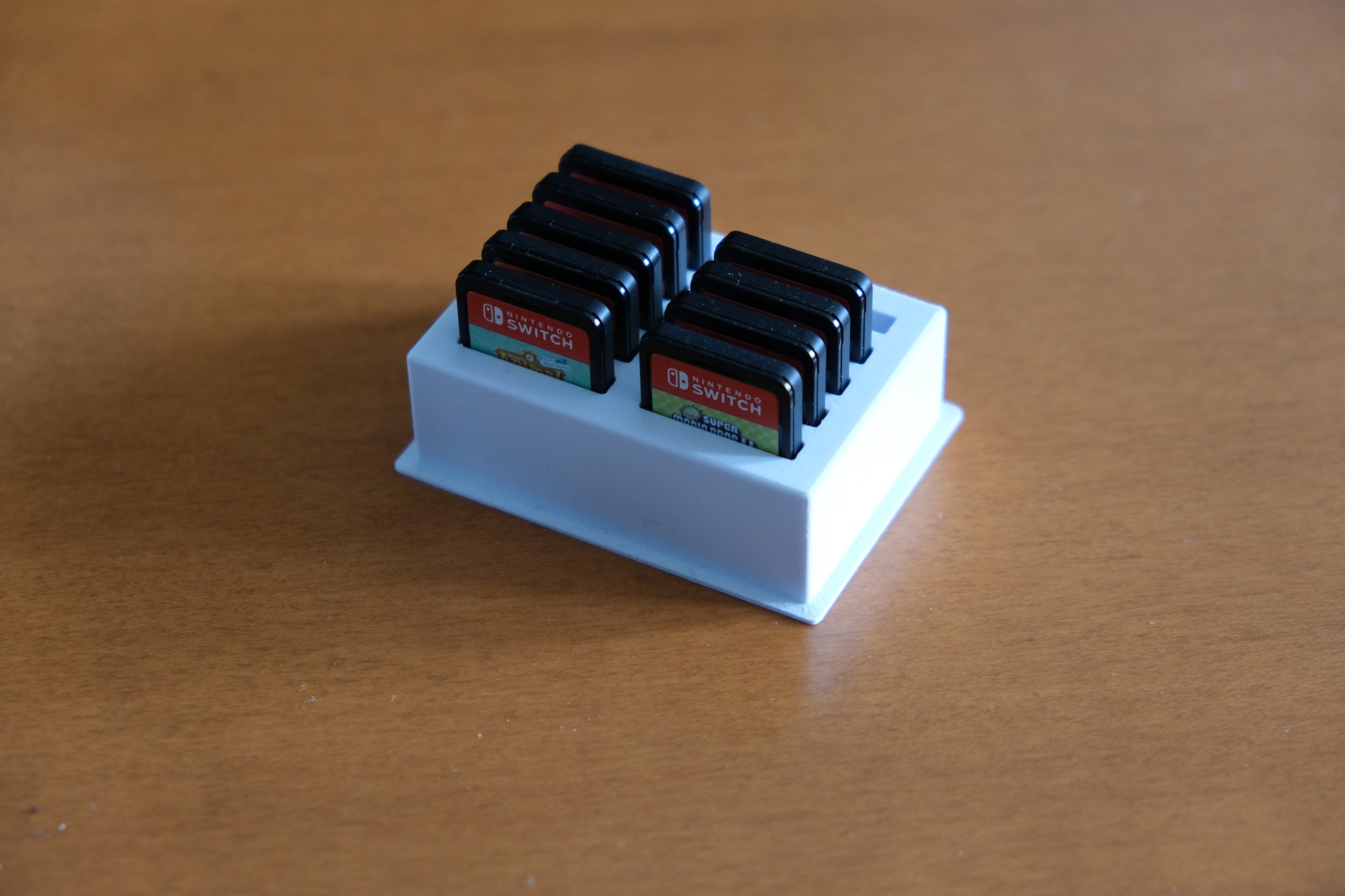 Giá đỡ hộp game Nintendo Switch cho 10 băng game