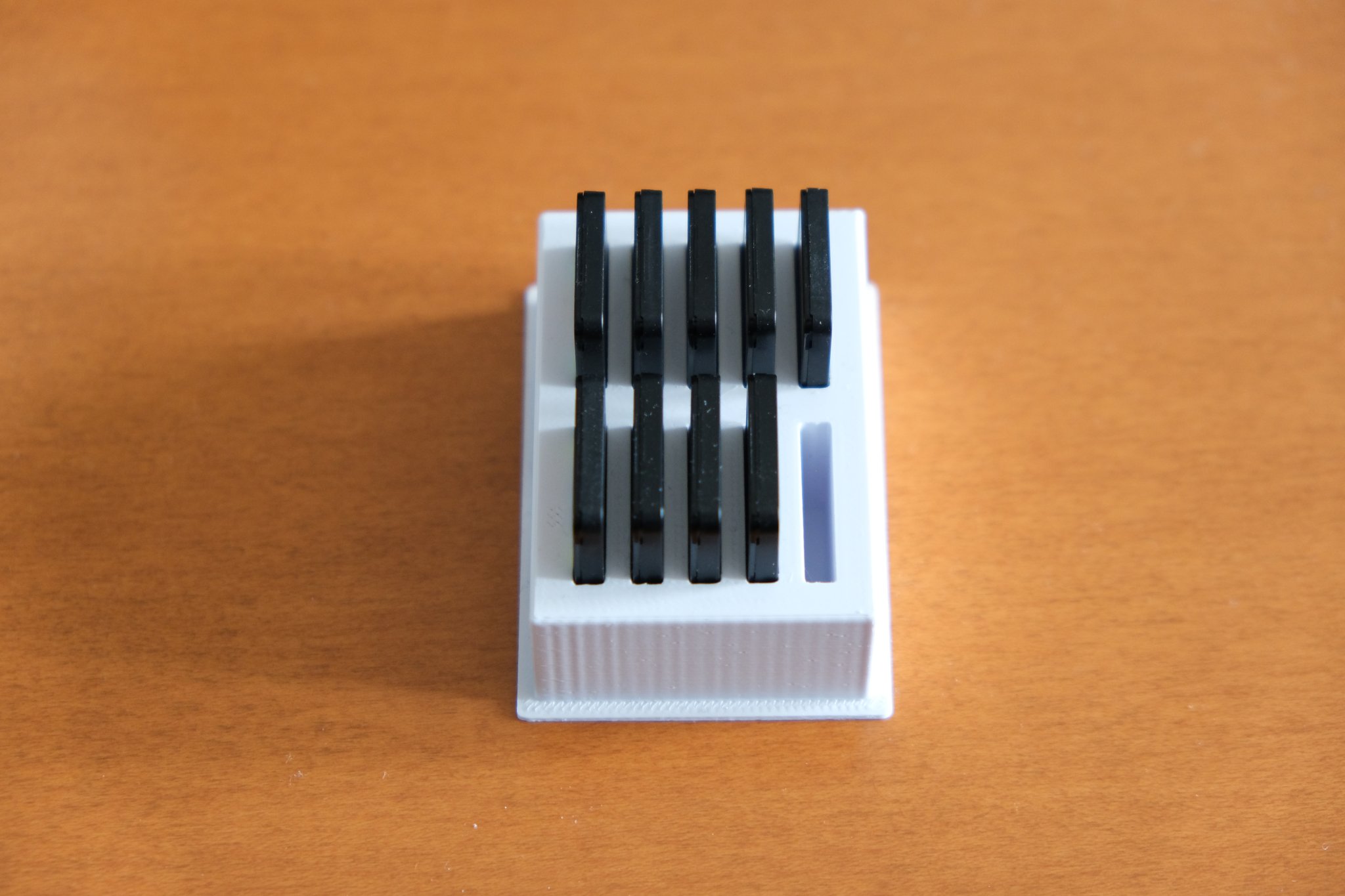 Giá đỡ hộp game Nintendo Switch cho 10 băng game