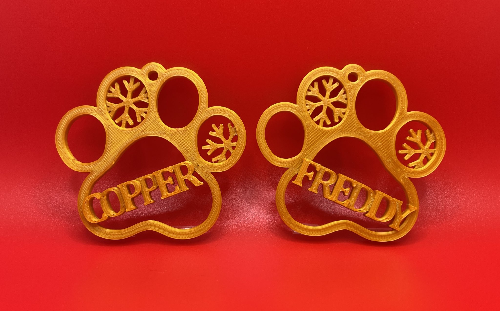 Móc treo chân cho chó và mèo với họa tiết bông tuyết