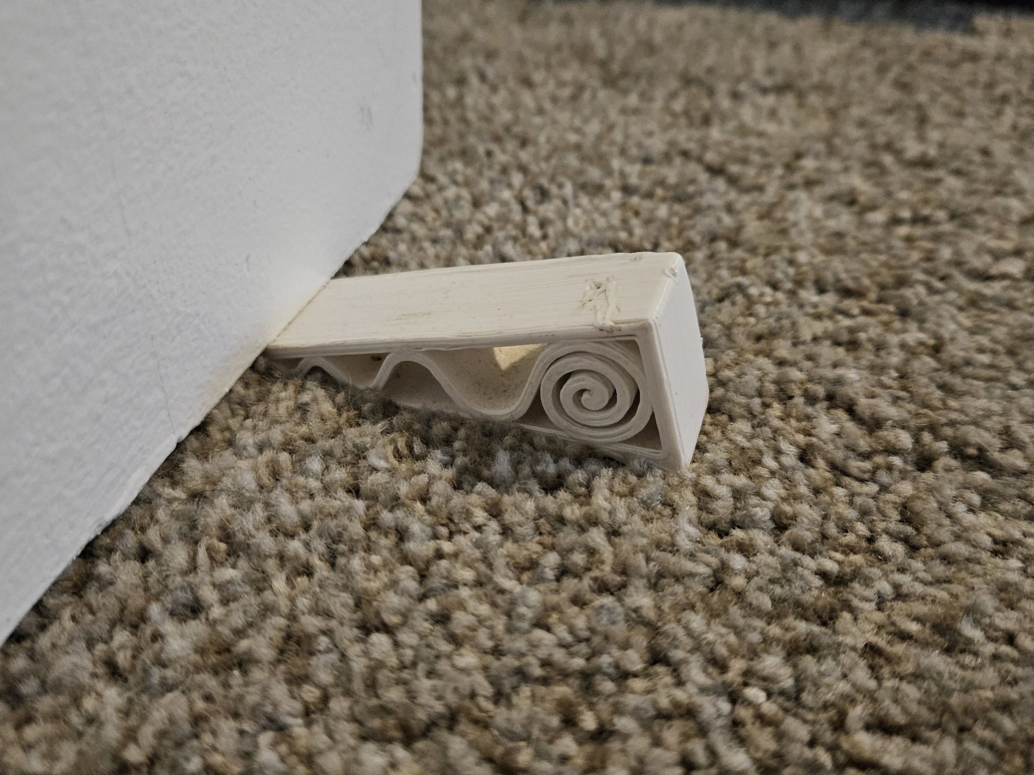 Cái chặn cửa tiện lợi cho thảm trải sàn