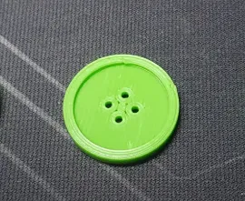 Nút bấm 3D đơn giản với bốn lỗ trung tâm