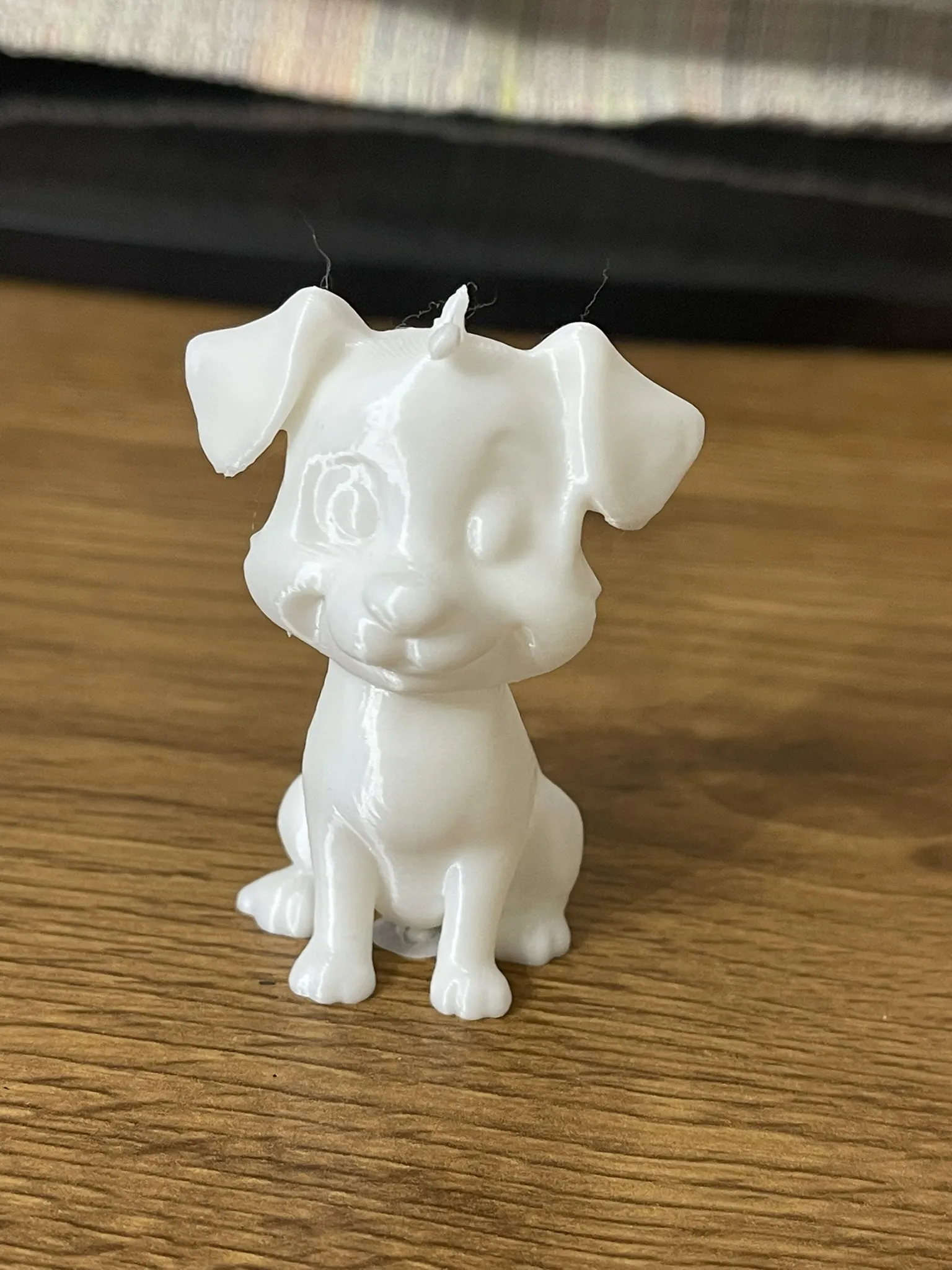 Mô hình chó ngồi chuẩn bị sơn tay