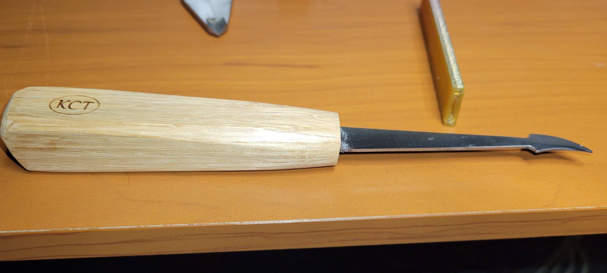 Đồ che dao chạm khắc gỗ KCT cho rìu rộng