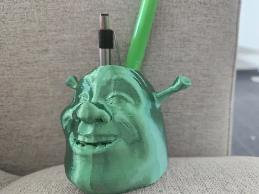 Giá đỡ bút hình mặt Ogar Shrek dễ thương