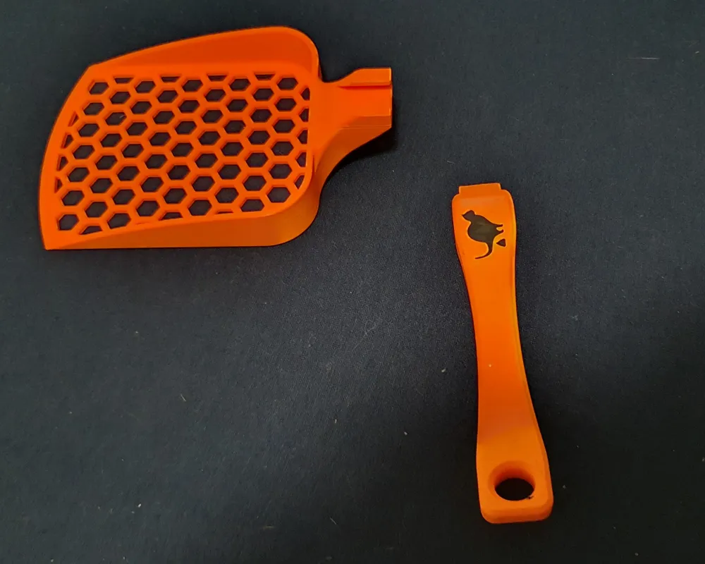 Xẻng xúc cát cho mèo với tay cầm chắc chắn