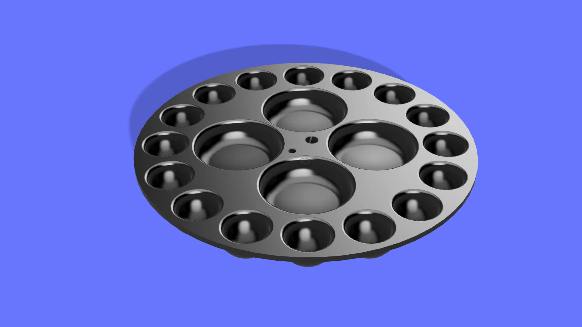 Bảng màu sơn với giá đỡ cọ vẽ trung tâm