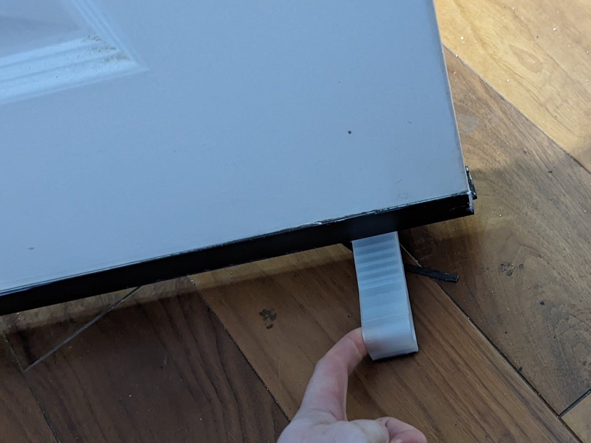 Đồ chặn cửa kéo từ hai phía cho thảm và sàn gỗ