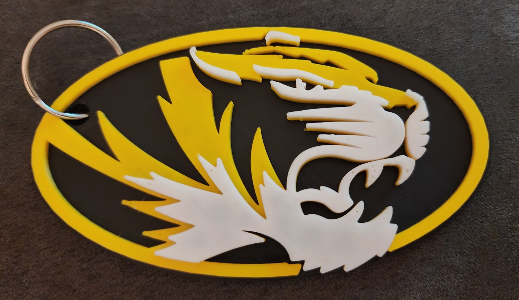 Biểu tượng và móc khóa Missouri Tigers nhiều màu sắc