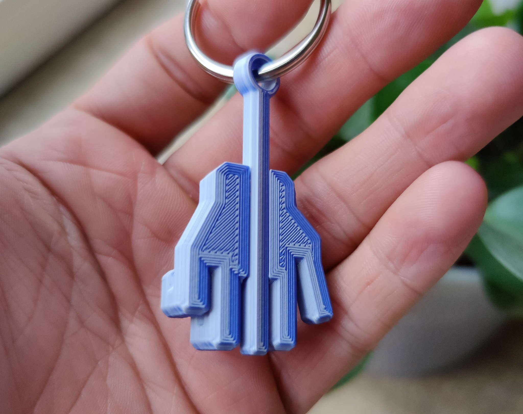 Chìa khóa đeo tay hình ngón giữa vui nhộn