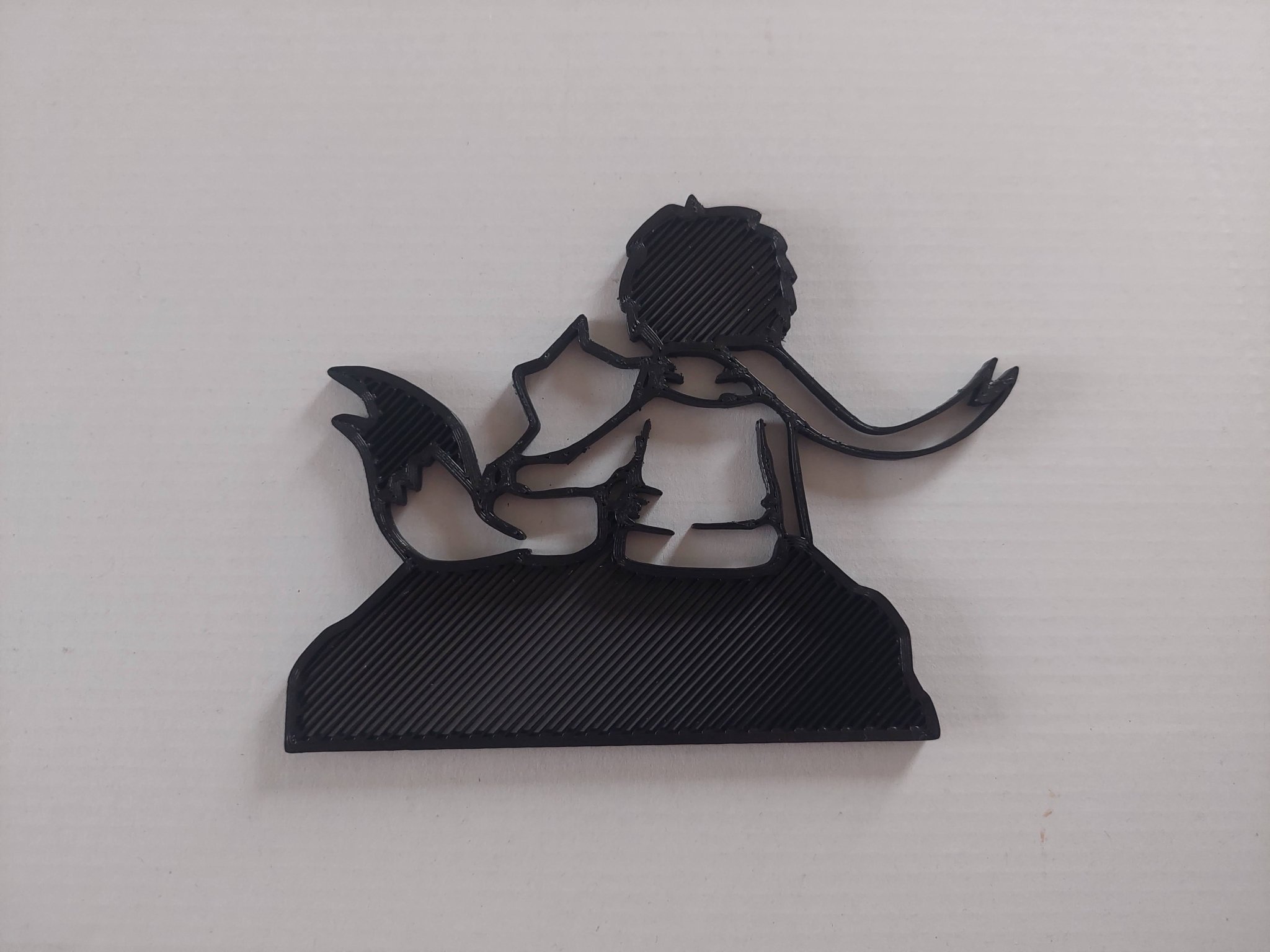 Silhouette hoàng tử bé ngồi trên mặt trăng với cáo