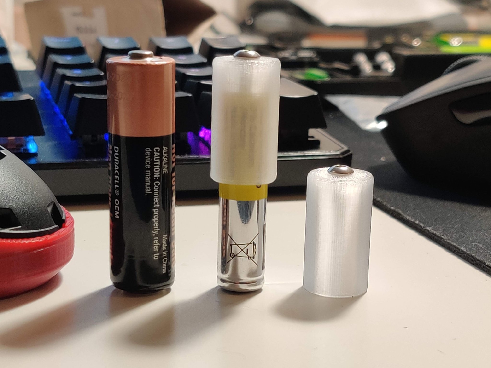 Bộ chuyển đổi pin AAA sang AA nhẹ cho chuột