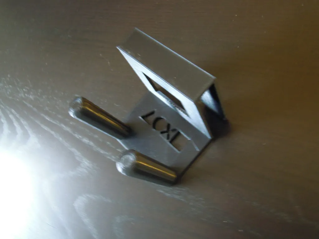 Giá đỡ điều khiển PS4 treo tường tiết kiệm không gian