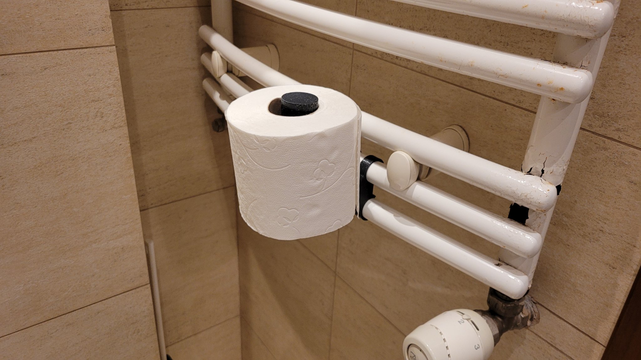 Giá đỡ giấy vệ sinh gắn tường cho bộ tản nhiệt phòng tắm