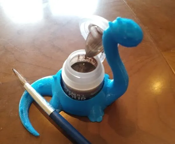 Giá đỡ bình sơn hình khủng long dễ thương