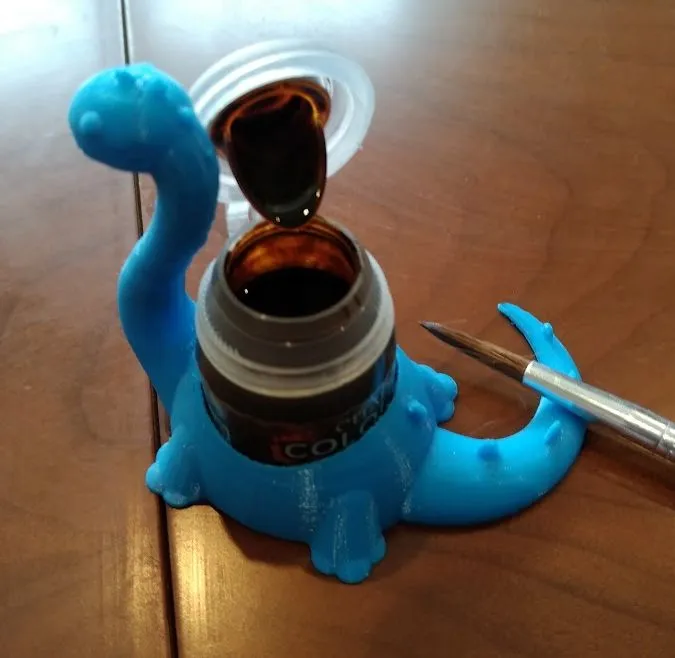 Giá đỡ bình sơn hình khủng long dễ thương