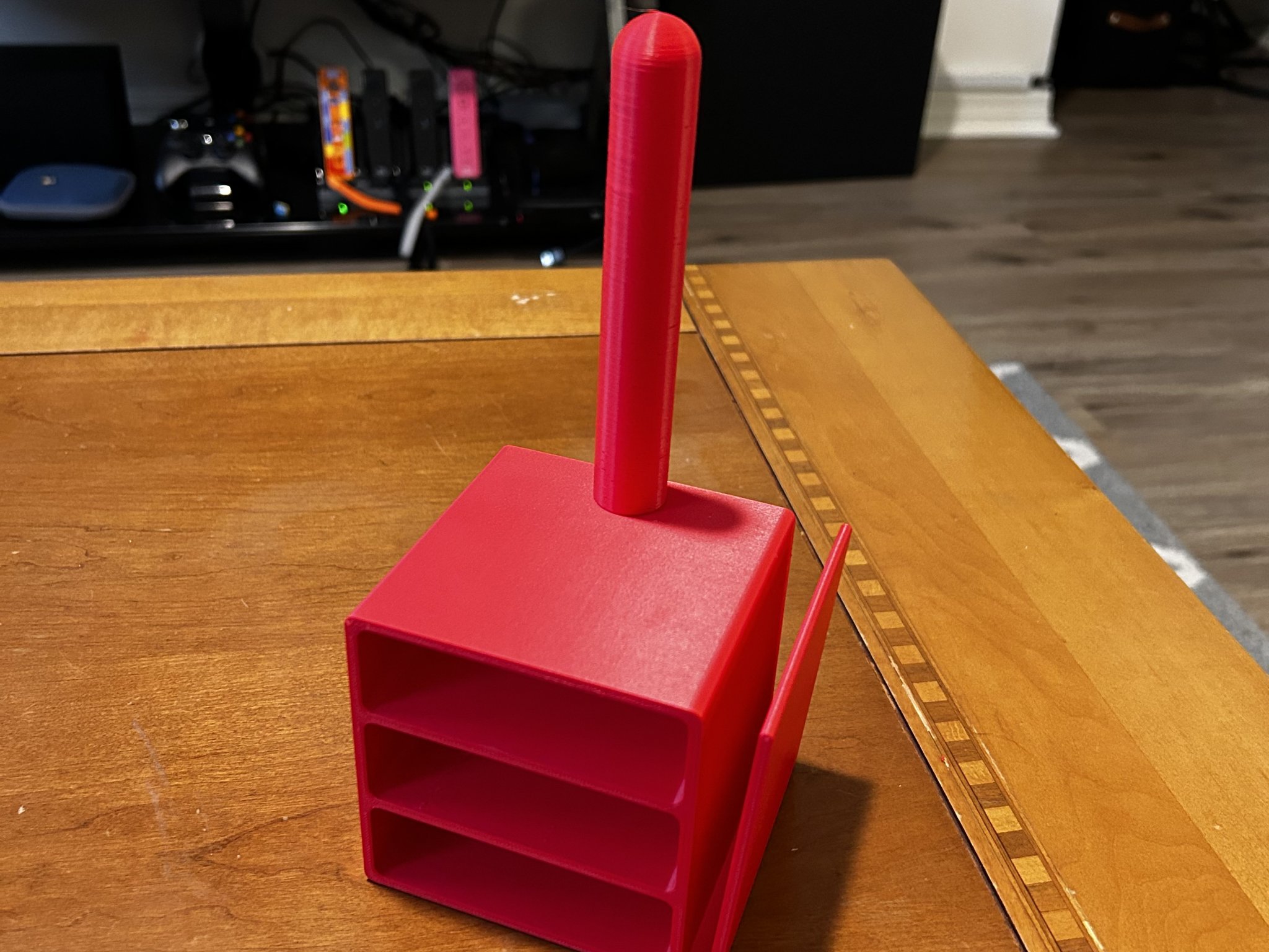 Giá đỡ nhỏ cho linh kiện và sách hướng dẫn máy in 3D