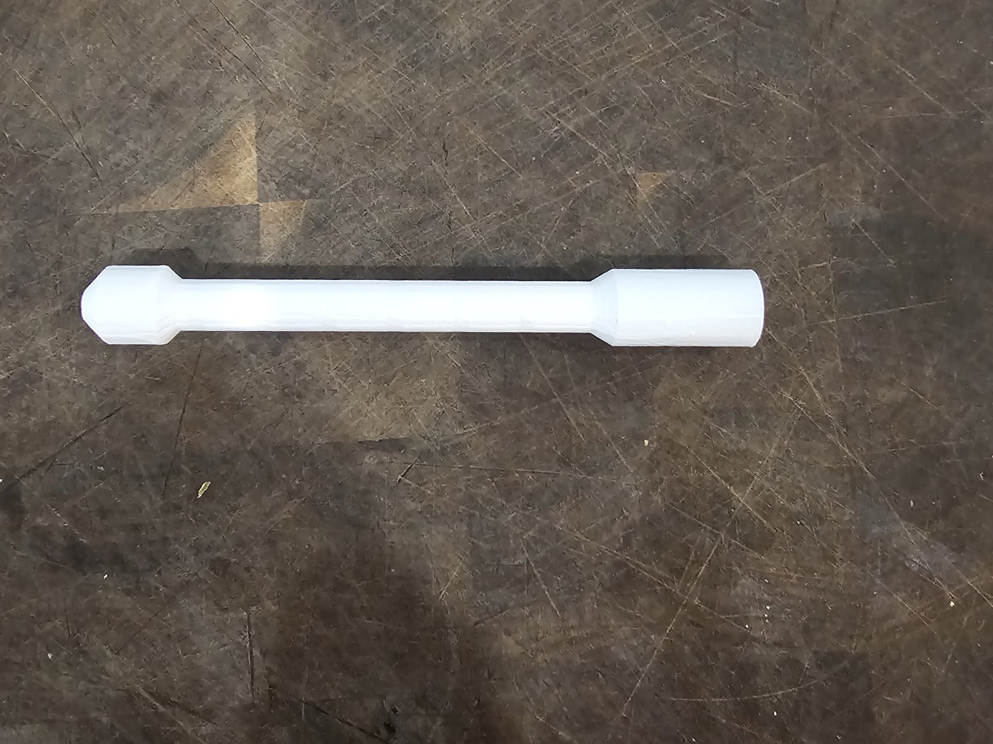 Công cụ lấy pin AA bằng nam châm tiện lợi