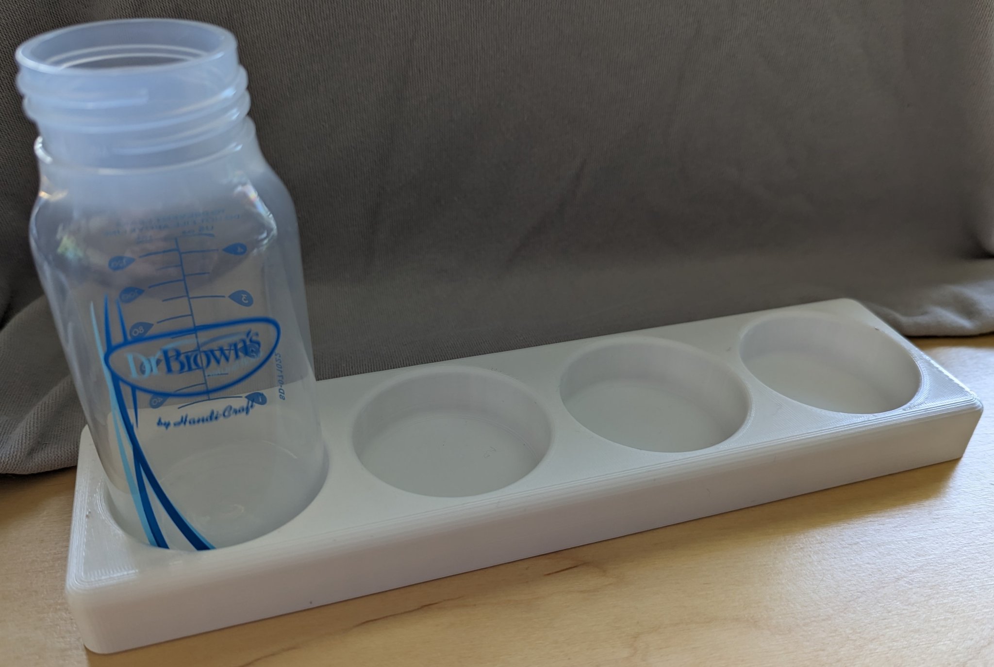 Giá đỡ bình sữa 4oz Dr. Brown cho tủ lạnh