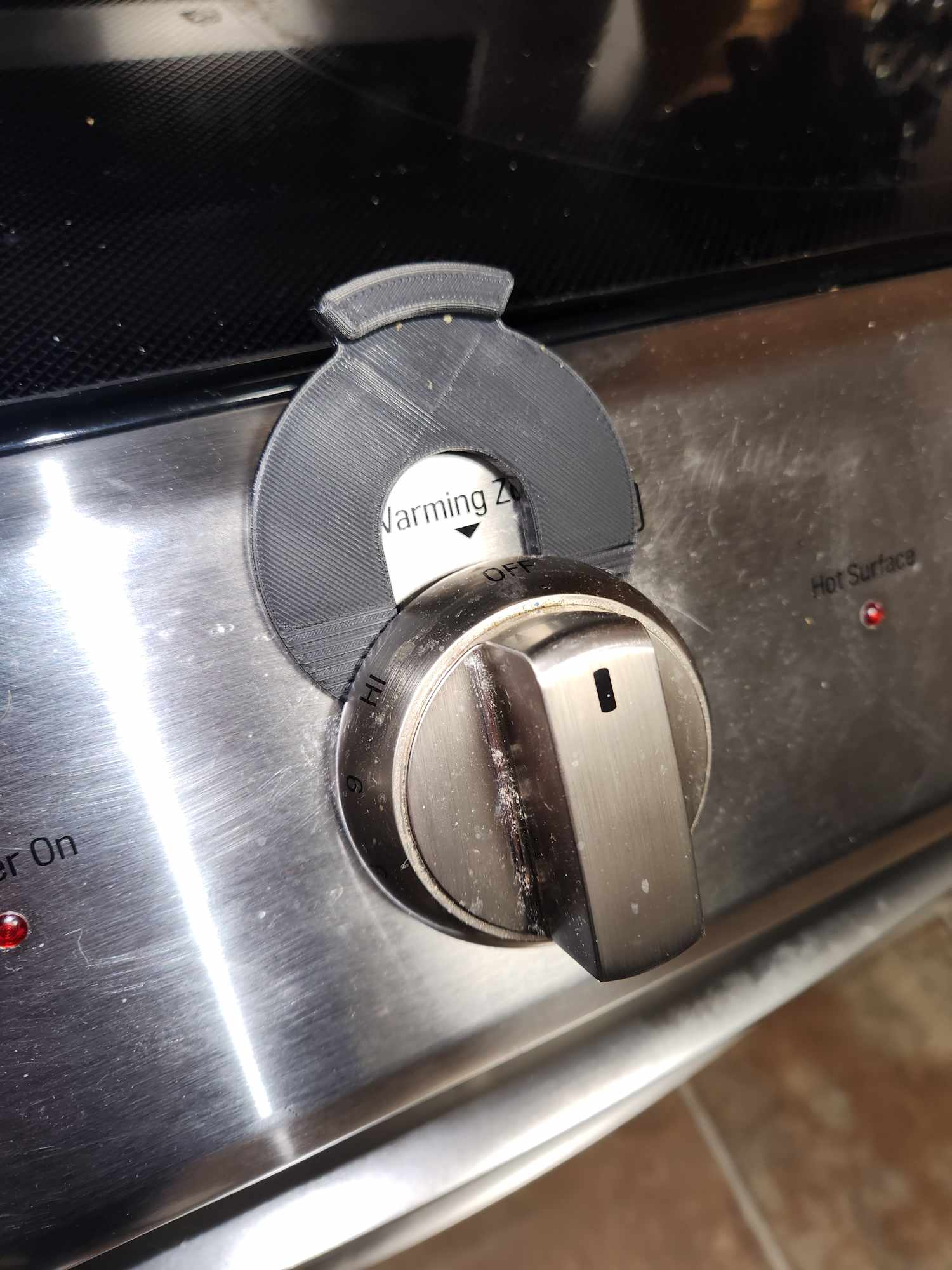 Khóa chặn núm bếp điện LG chống va chạm