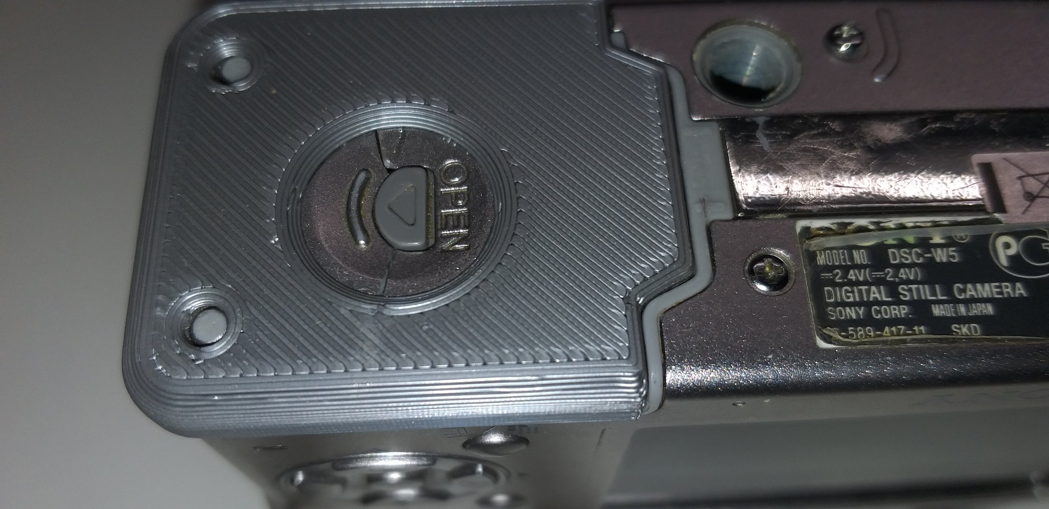 Sửa chữa nắp pin cho máy ảnh Sony Cybershot DSC-W5