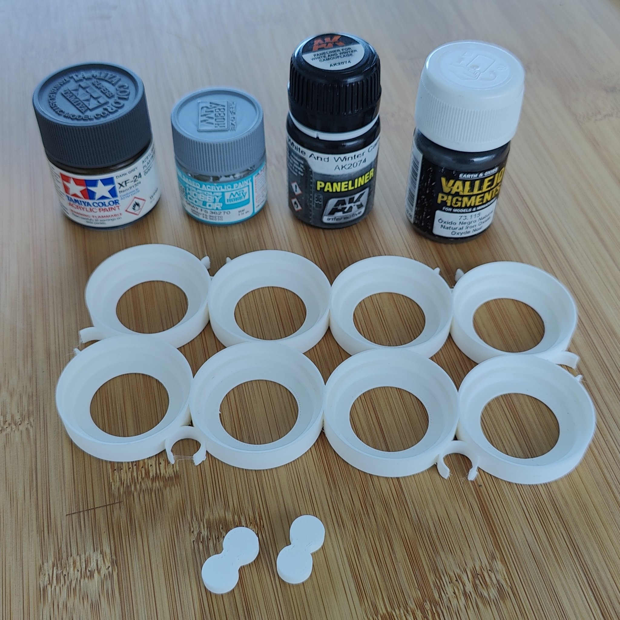 Tiêu đề Bộ sắp xếp mô-đun đa năng cho nhiều mẫu chai sơn tro