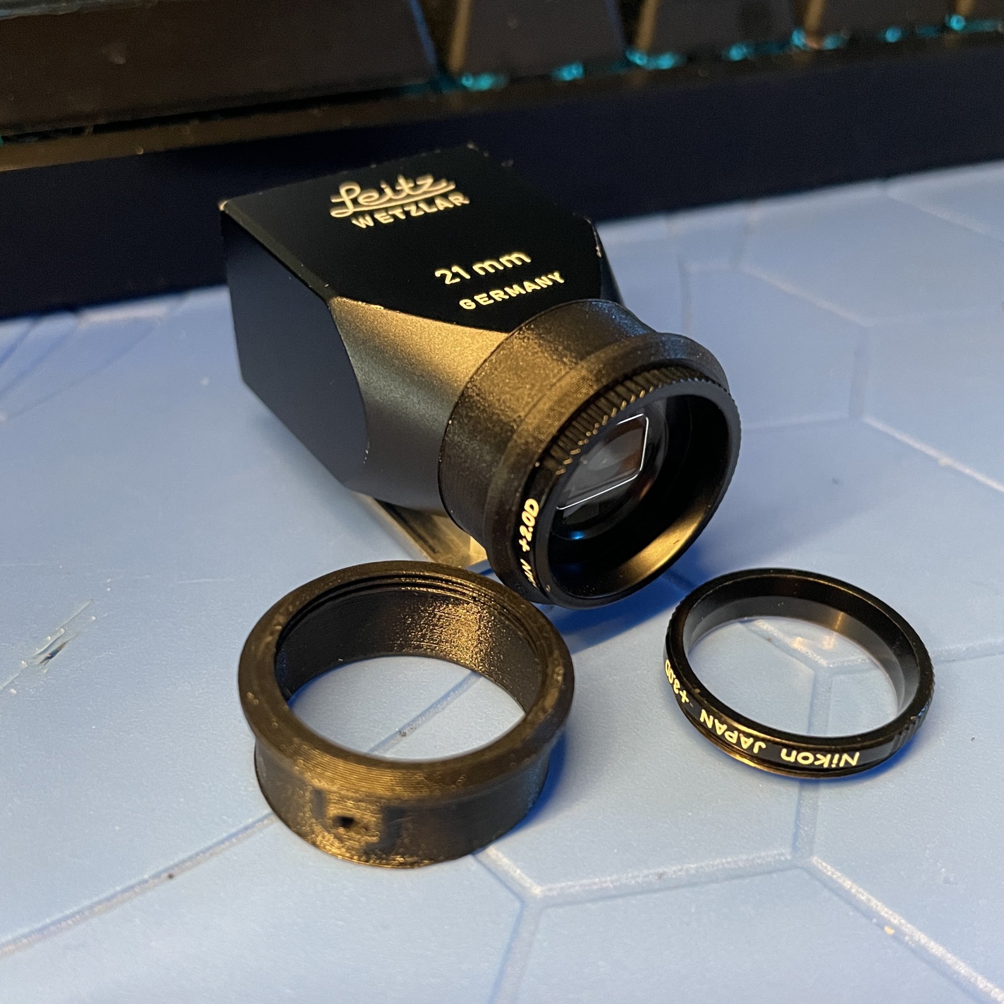 Tiêu đề Bộ chuyển đổi Diopter của Nikon cho kính ngắm Leica Bri