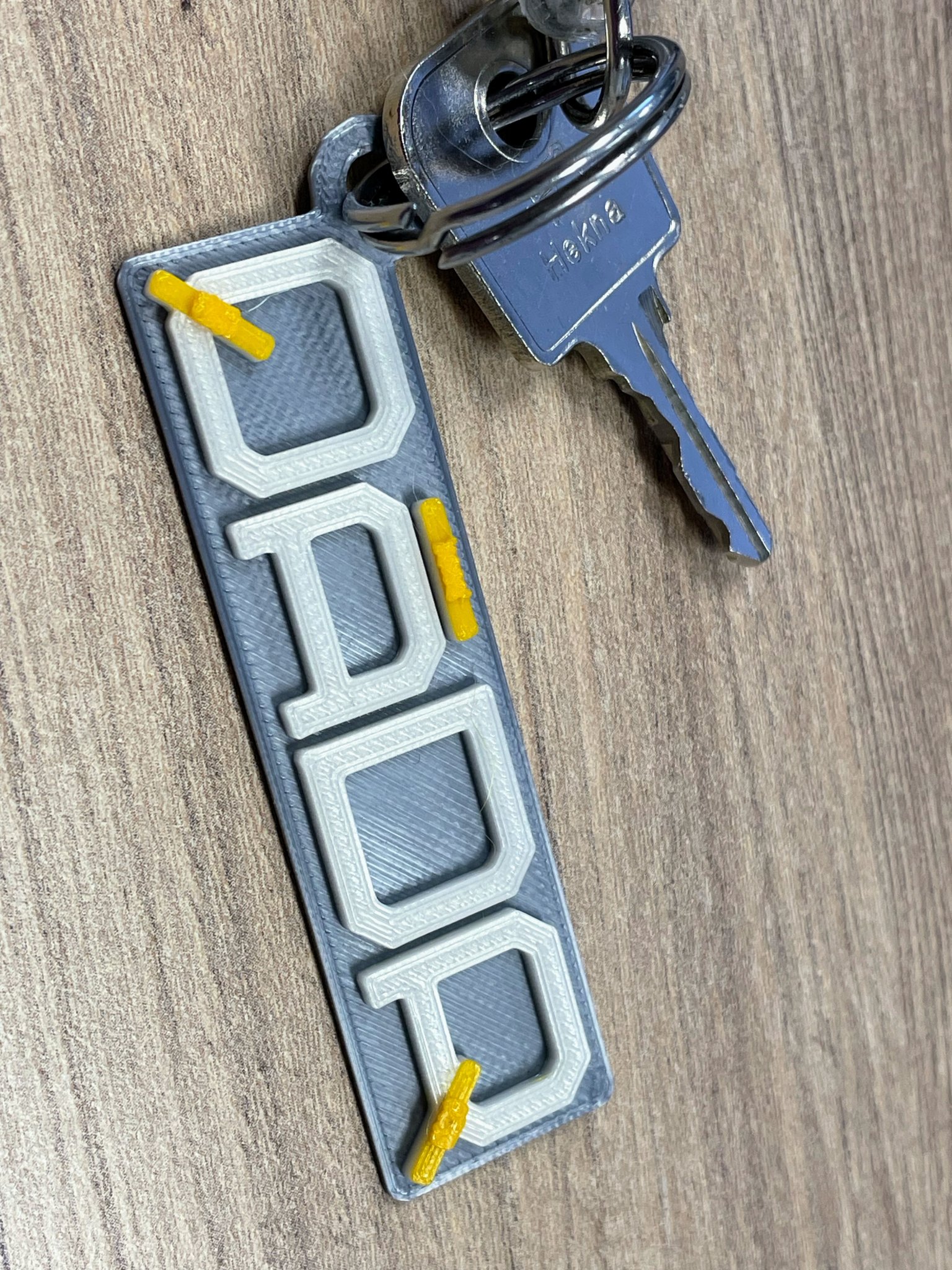 QÁDR Keychain logo