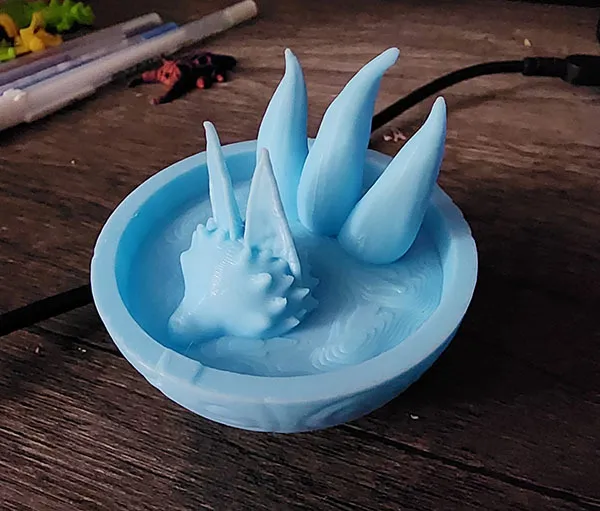 Kitsune bathing in a tea cup