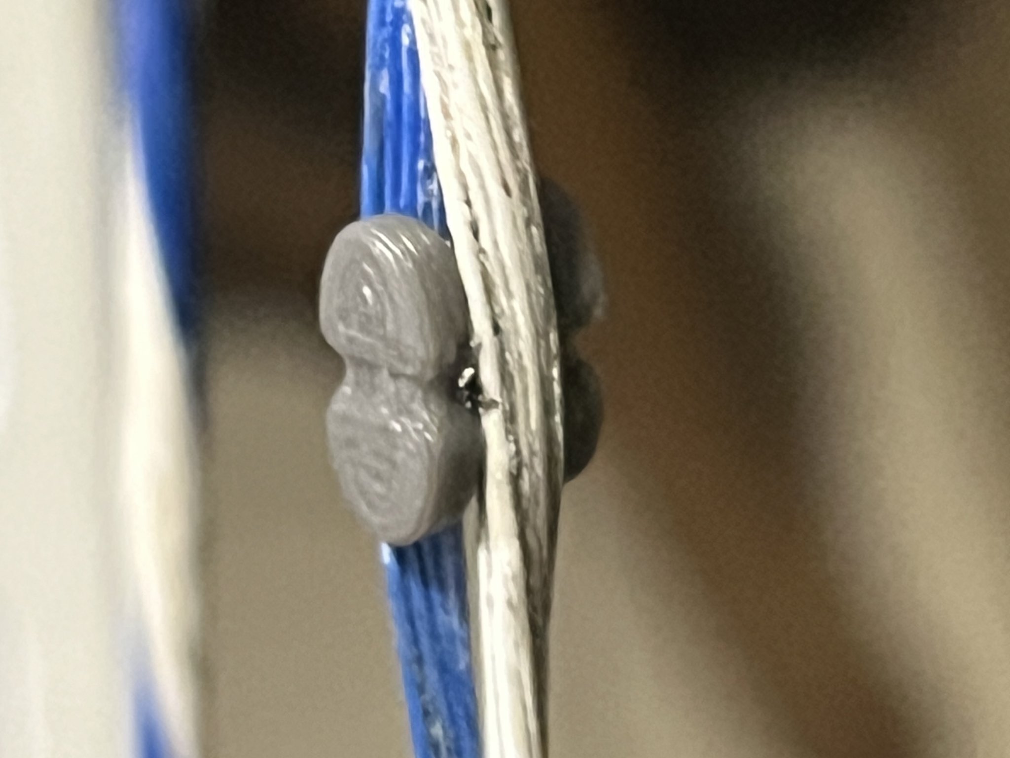 Peep sight rotation tuner for compound bow