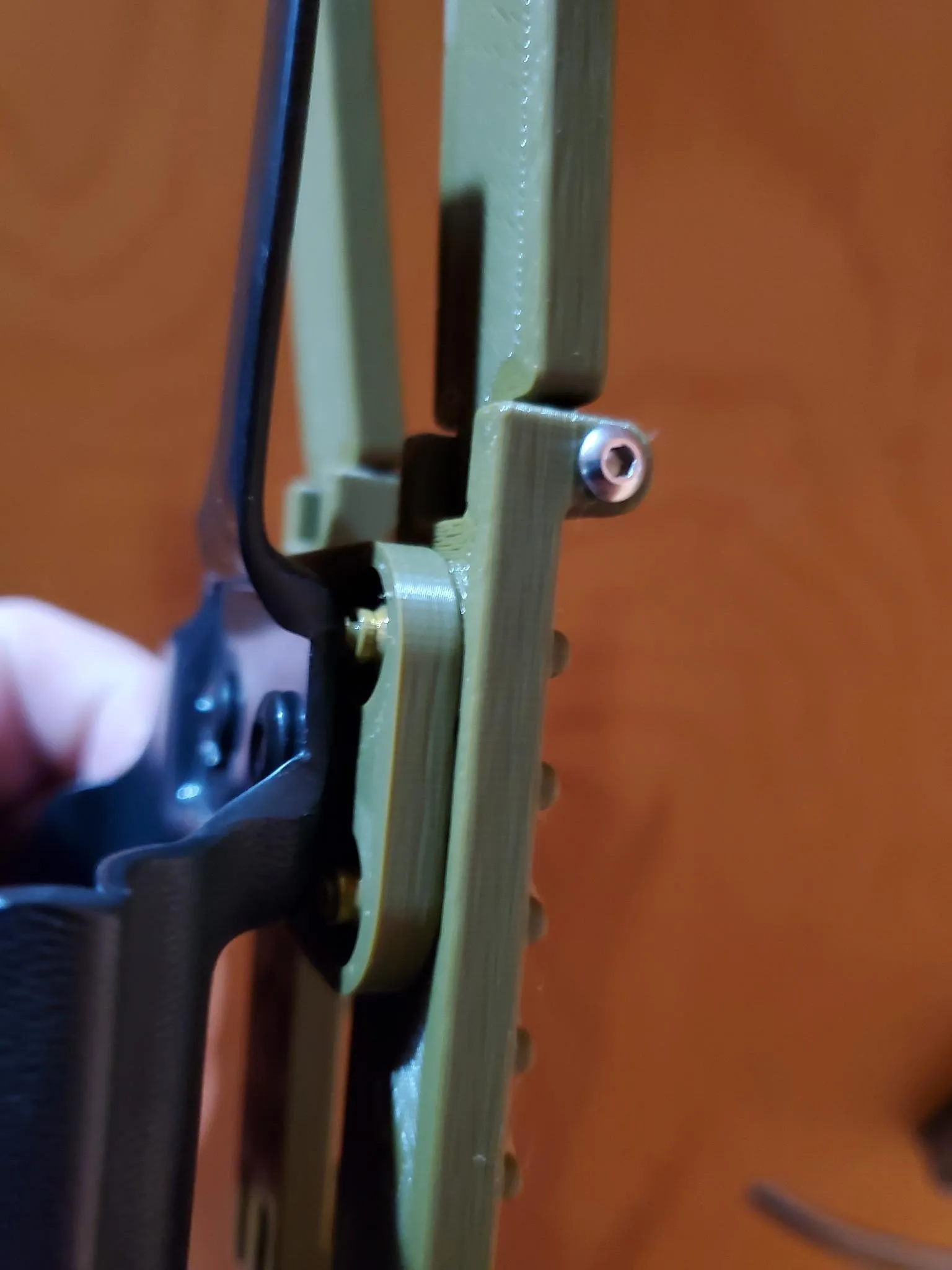 Mussy Molle clips to Vedder holster