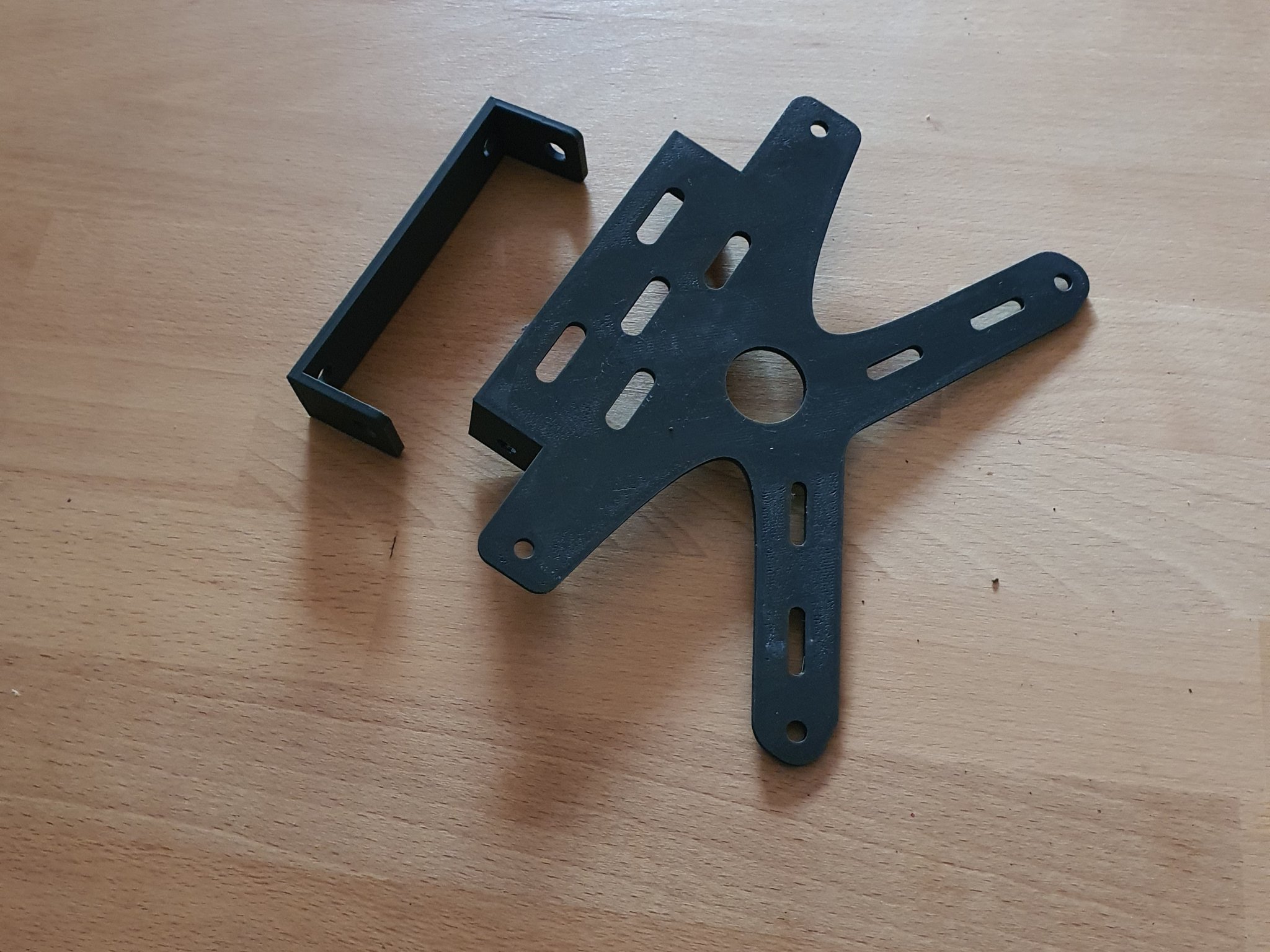 Giá đỡ biển số & xi nhan xe Derbi