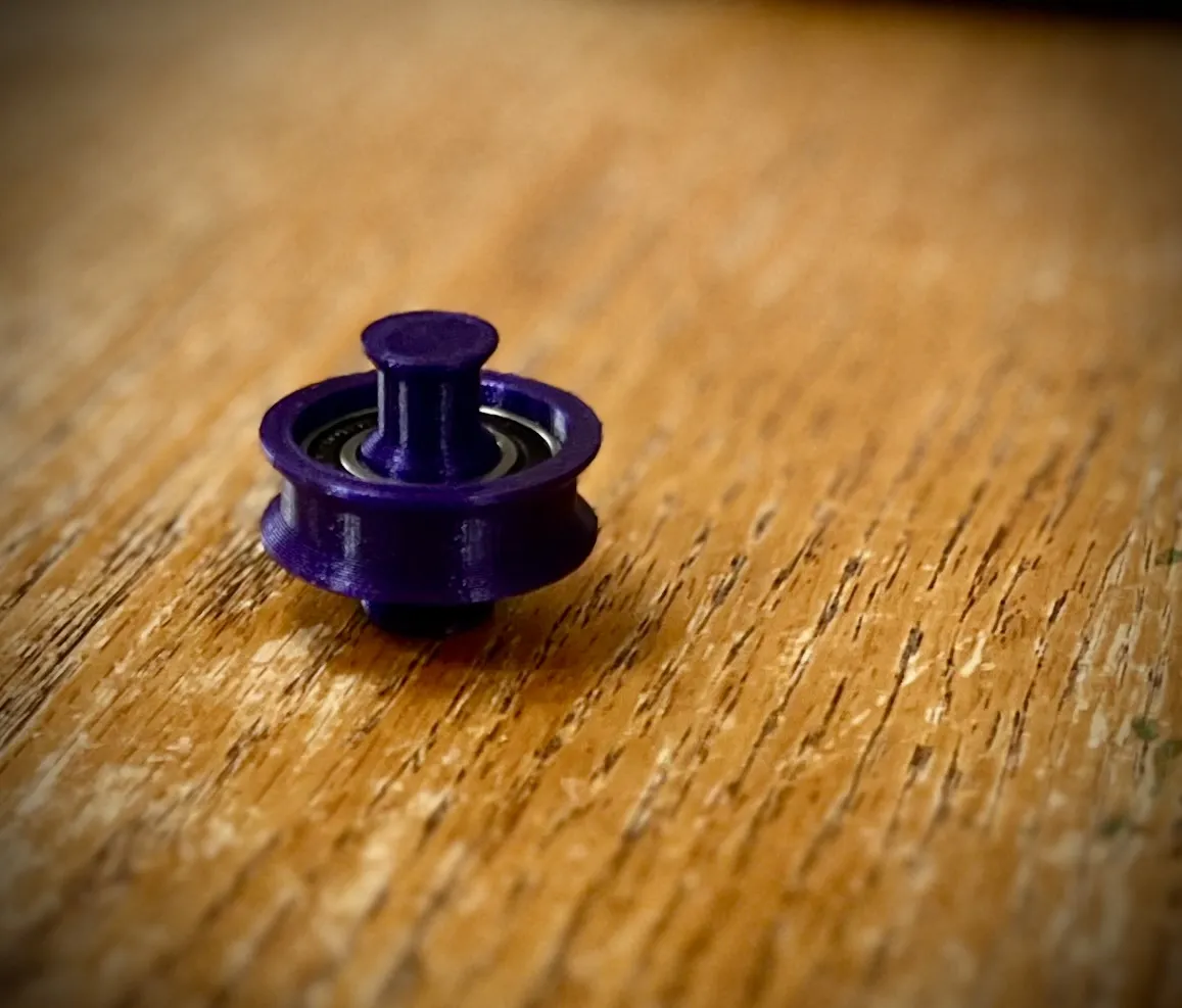 Bánh xe giữ cuộn dây tóc xài bạc đạn 6901