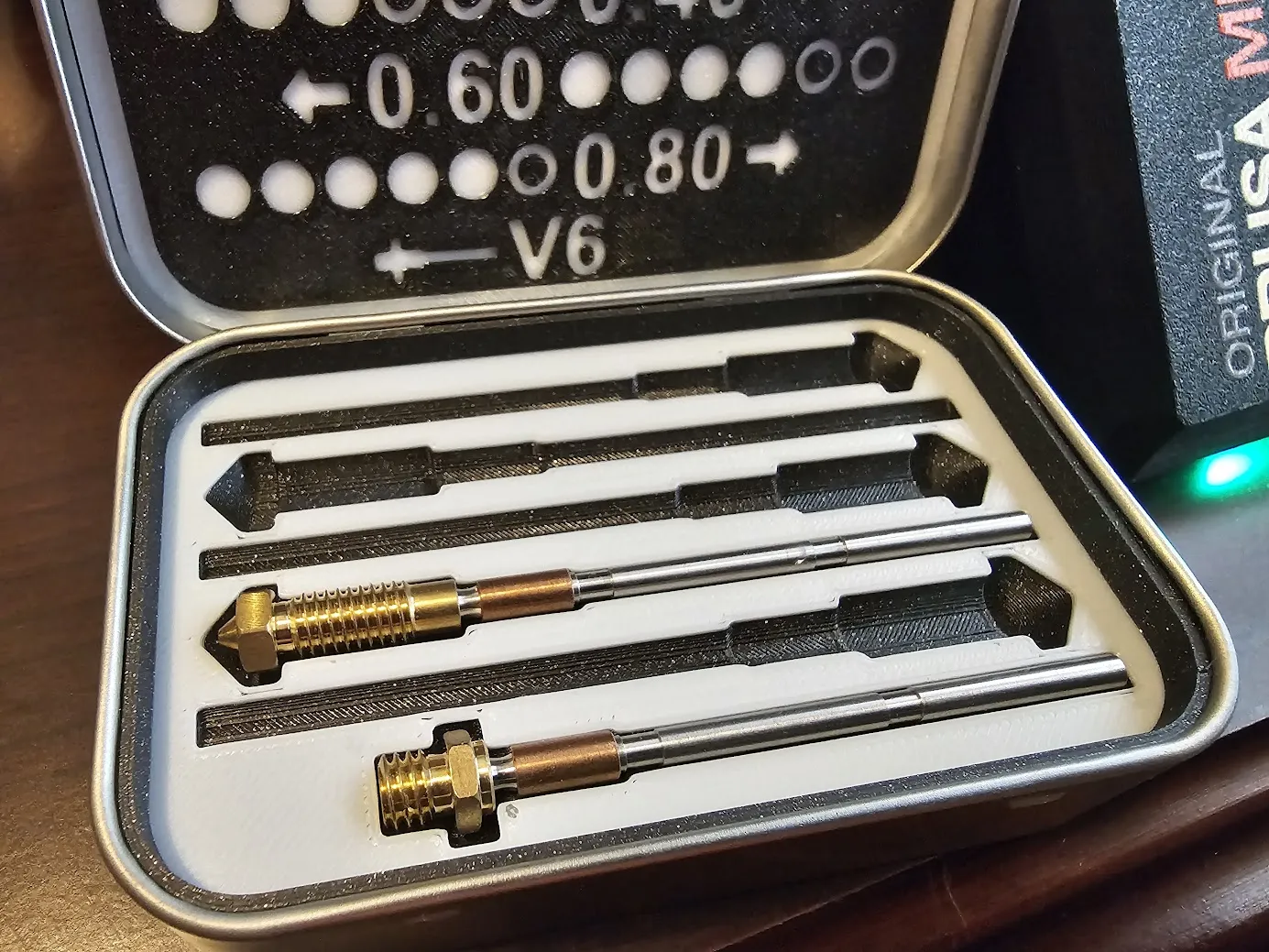 Tiêu đề Hộp vòi phun Nextruder - Mint Tin Insert Tóm tắt Đây là