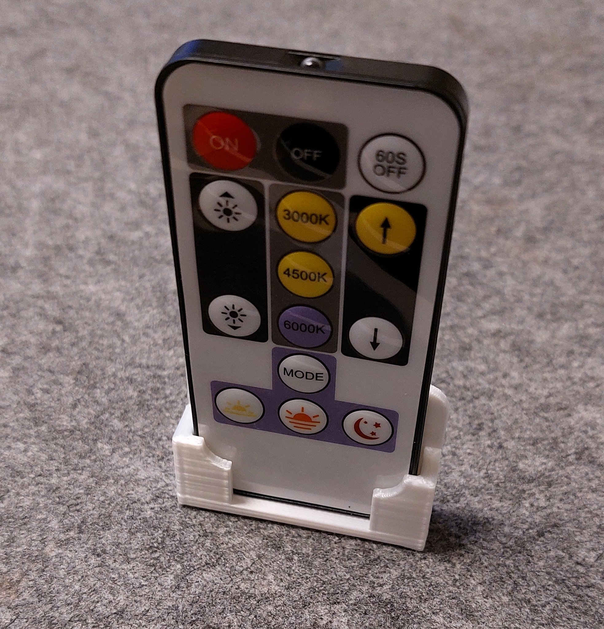 Tiêu đề Giá đỡ điều khiển từ xa có đèn LED sọc Tóm tắt