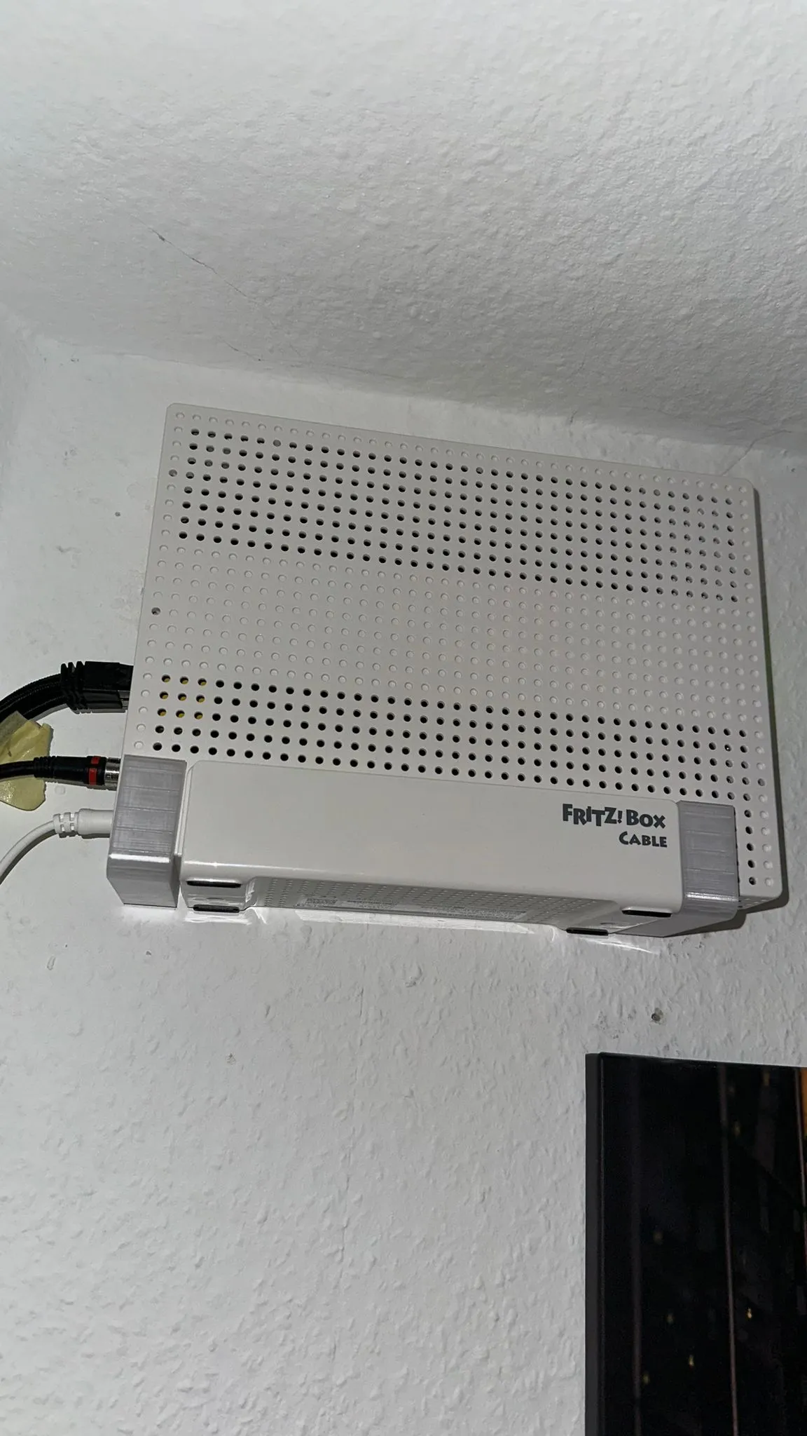 Tiêu đề Modem cáp AVM FritzBox 66906591 - Wallmount Tóm tắt Tườn