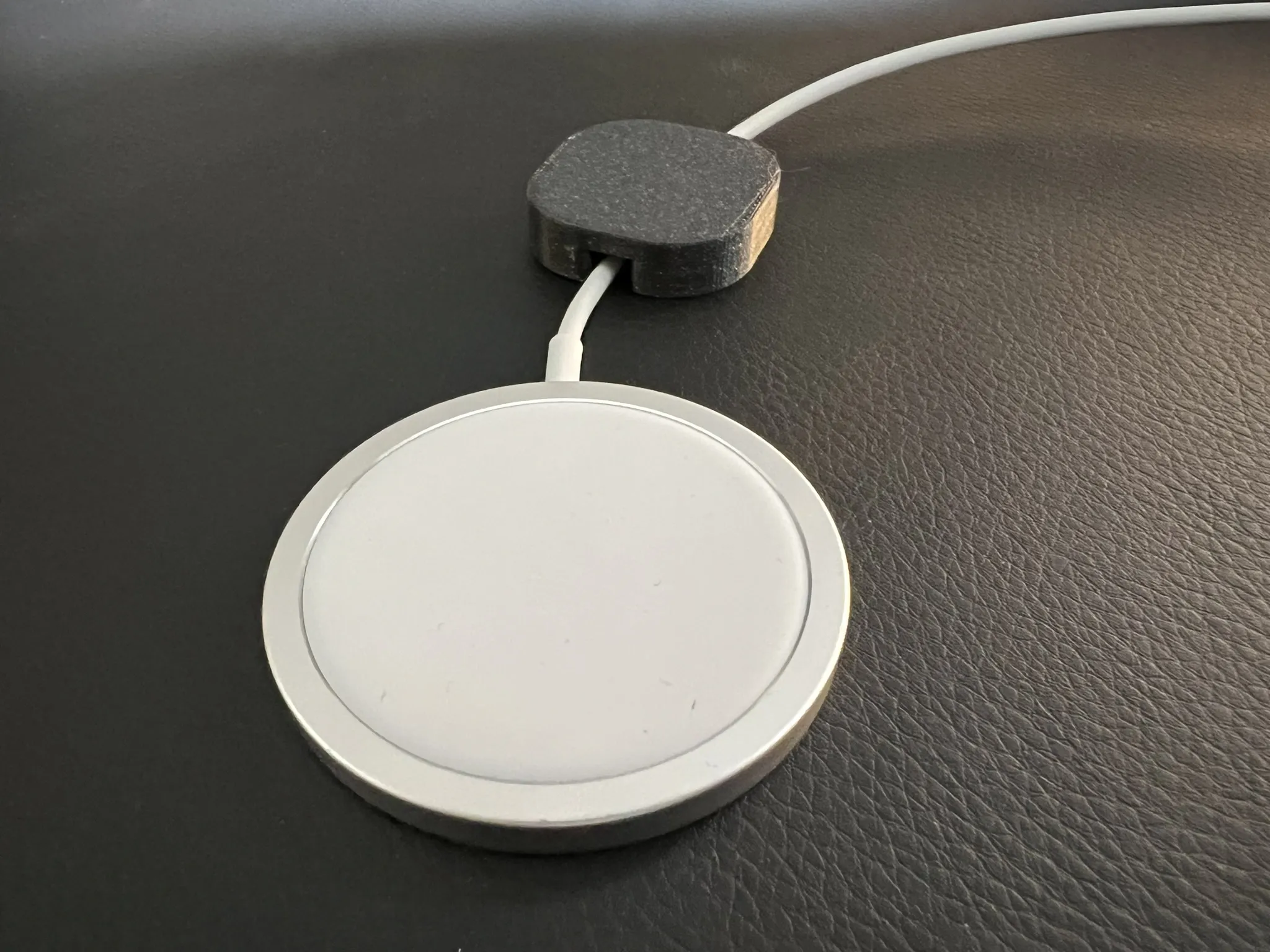 Magnetic cable holder for Secret Lab desks or other magnetic tables