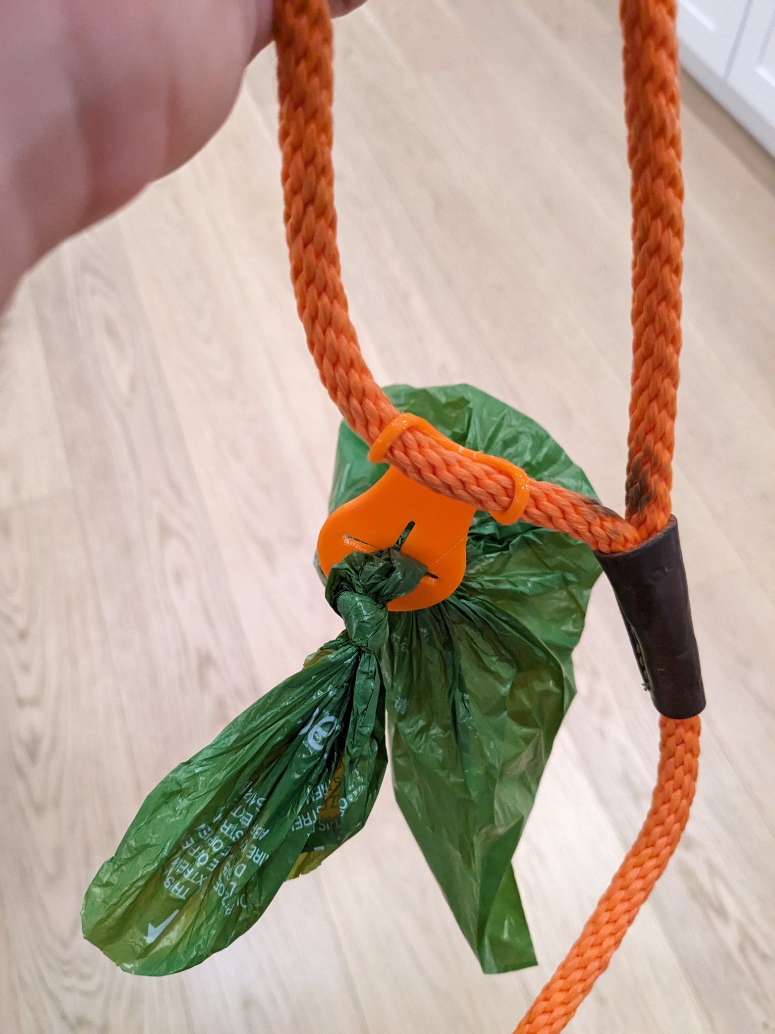 Flexible leash poop bag holder