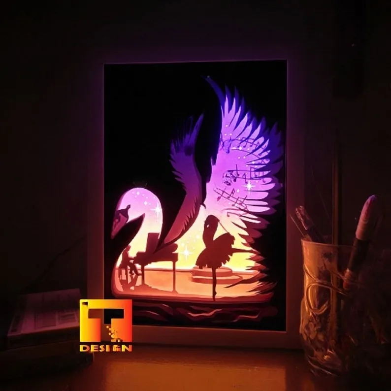 Tiêu đề Hộp đèn vũ công múa thiên nga trên sân khấu Tóm tắt