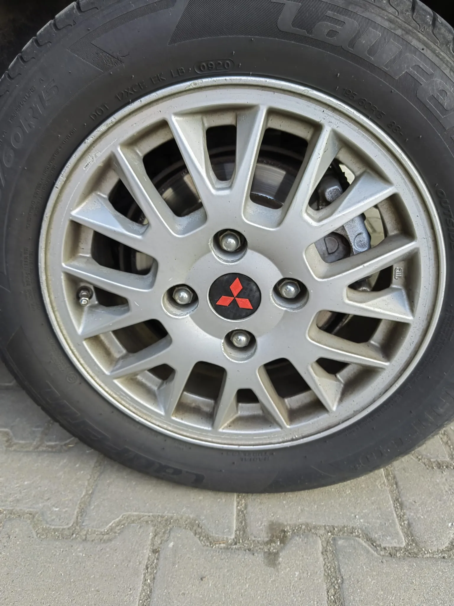 mitsubishi carisma tire rim logo