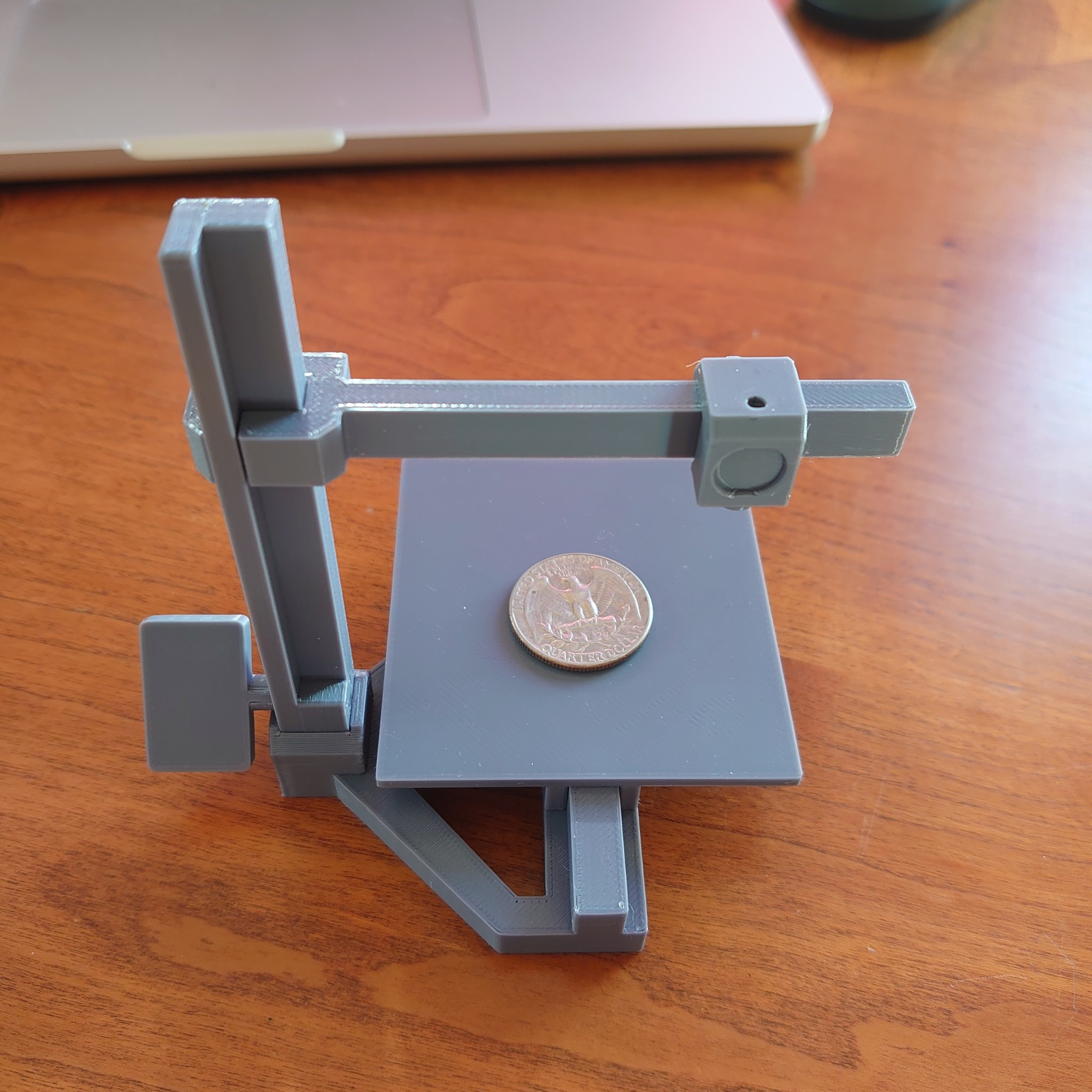 Toy model of a cantilever bed slinger