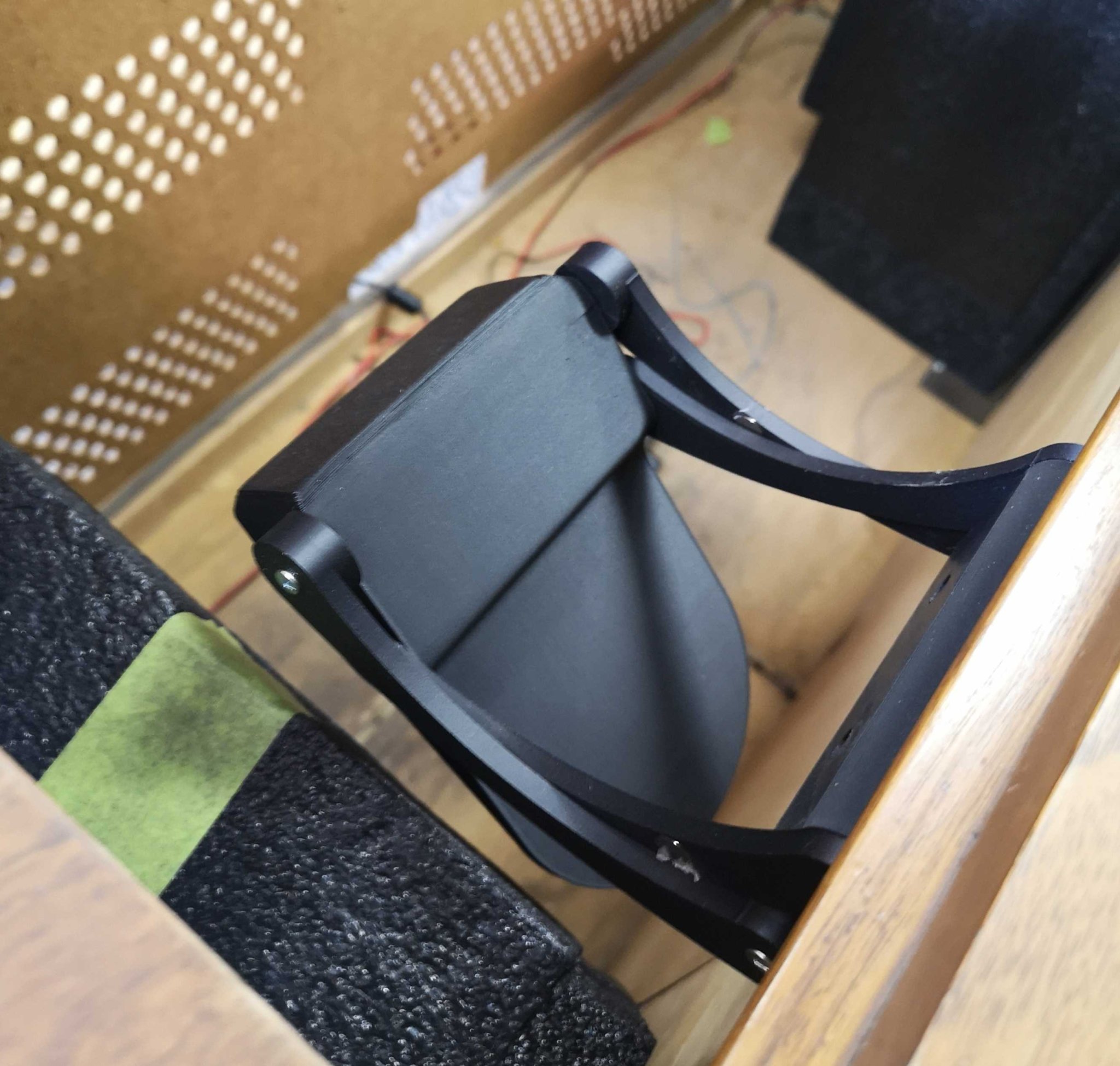 "Stow-away" Cantilevered Phone Stand with NFC tag recess and magnetic position lock