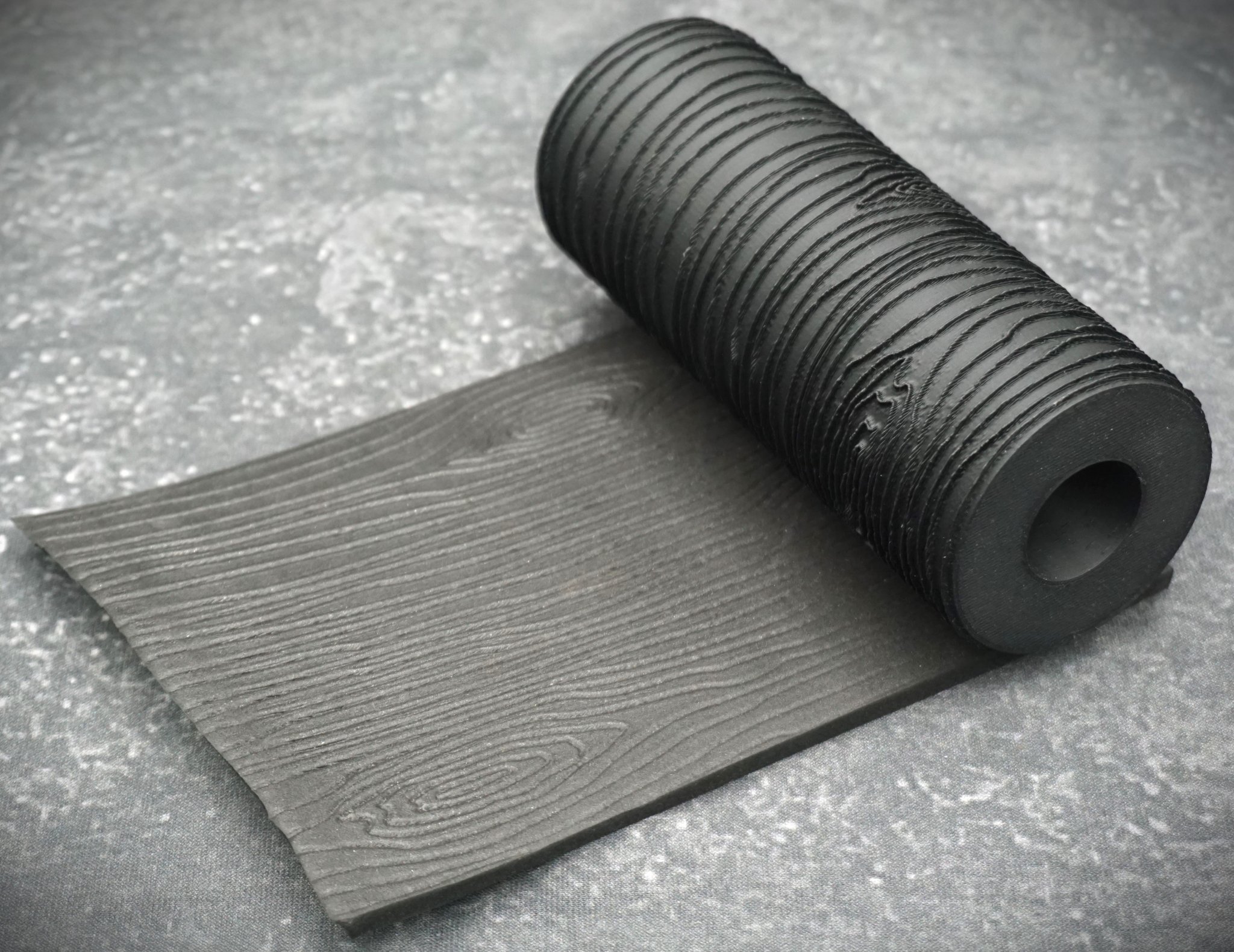 Textured Roll With Wood Grain Pattern