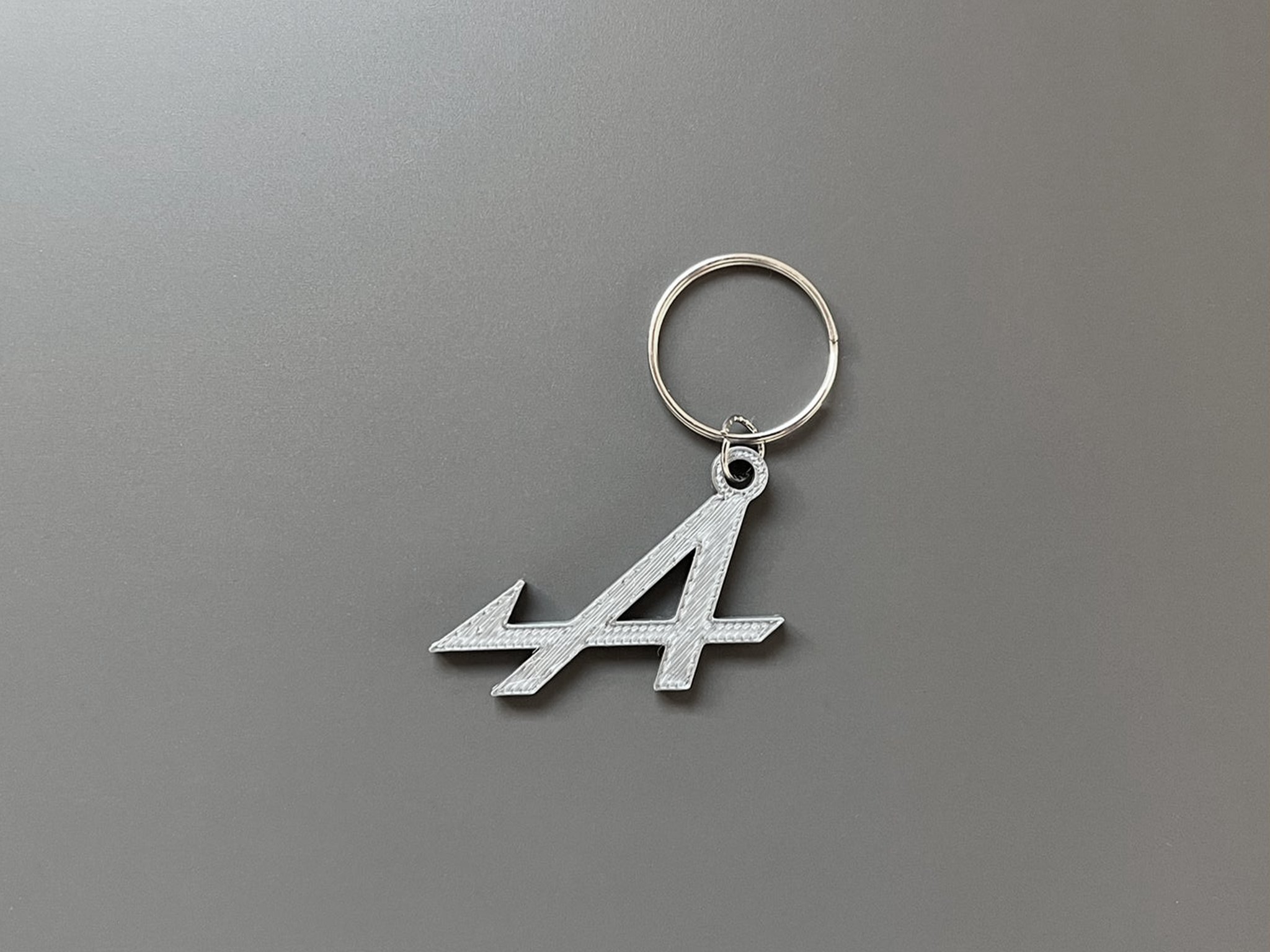 Tiêu đề Móc khóa Alpine Tóm tắt In 3D móc khóa thương hiệu Alp